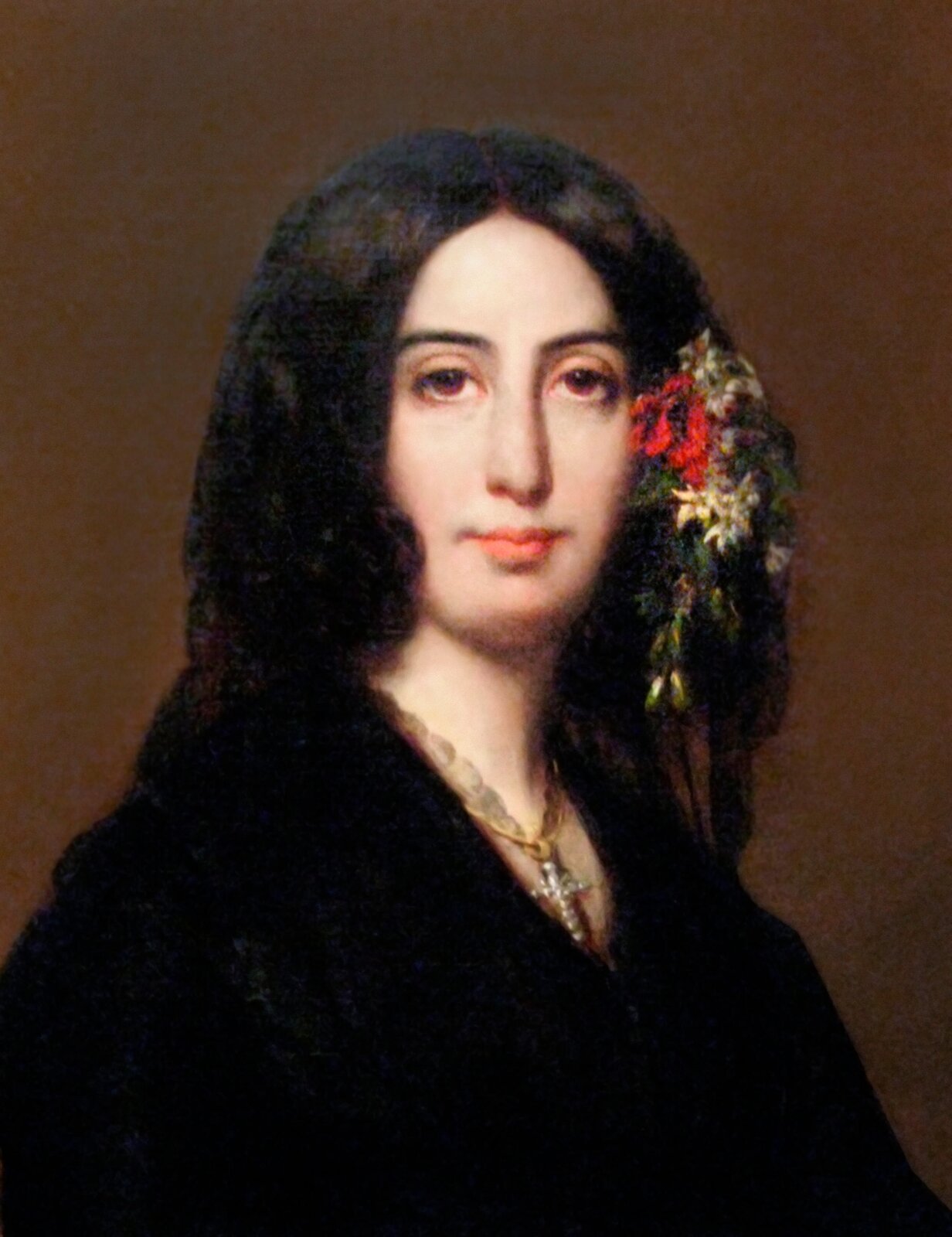 Obraz przedstawia portret George Sand. Młoda kobieta o kruczych, długich włosach. We włosy wpięty ma wianek ze świeżych kwiatów. Ubrana w czarny strój, na szyi ma duży krzyż na łańcuszku.