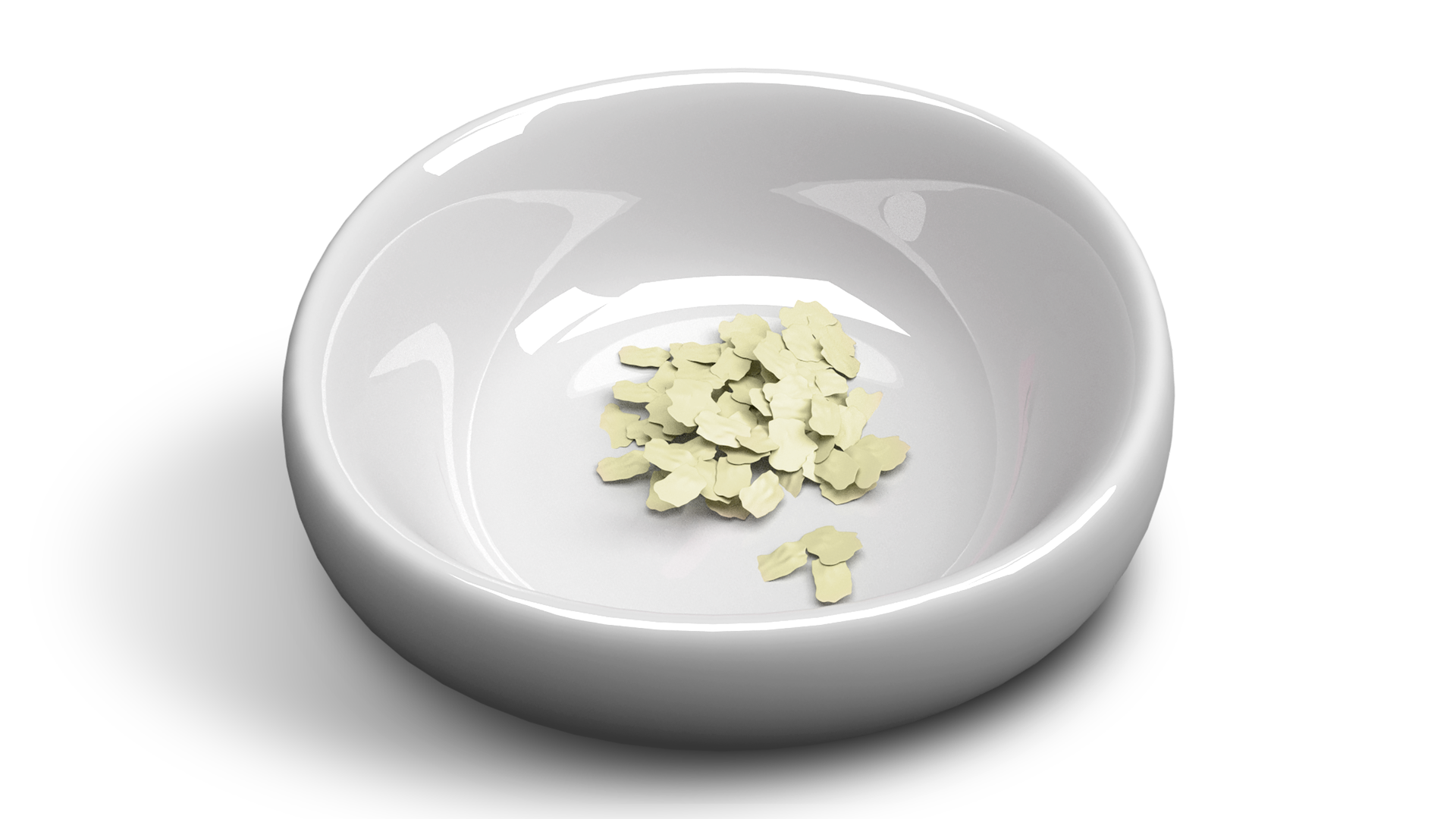 Na ilustracji w miseczce są zielonkawe, drobne, cienkie płatki. 