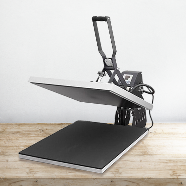 Zdjęcie przedstawia urządzenie składające się z dwóch kwadratowych paneli. Jeden z nich leży na blacie, drugi jest umieszczony nad nim. Z tyłu znajduje się mechanizm, dzięki któremu dwa panele można do siebie docisnąć.