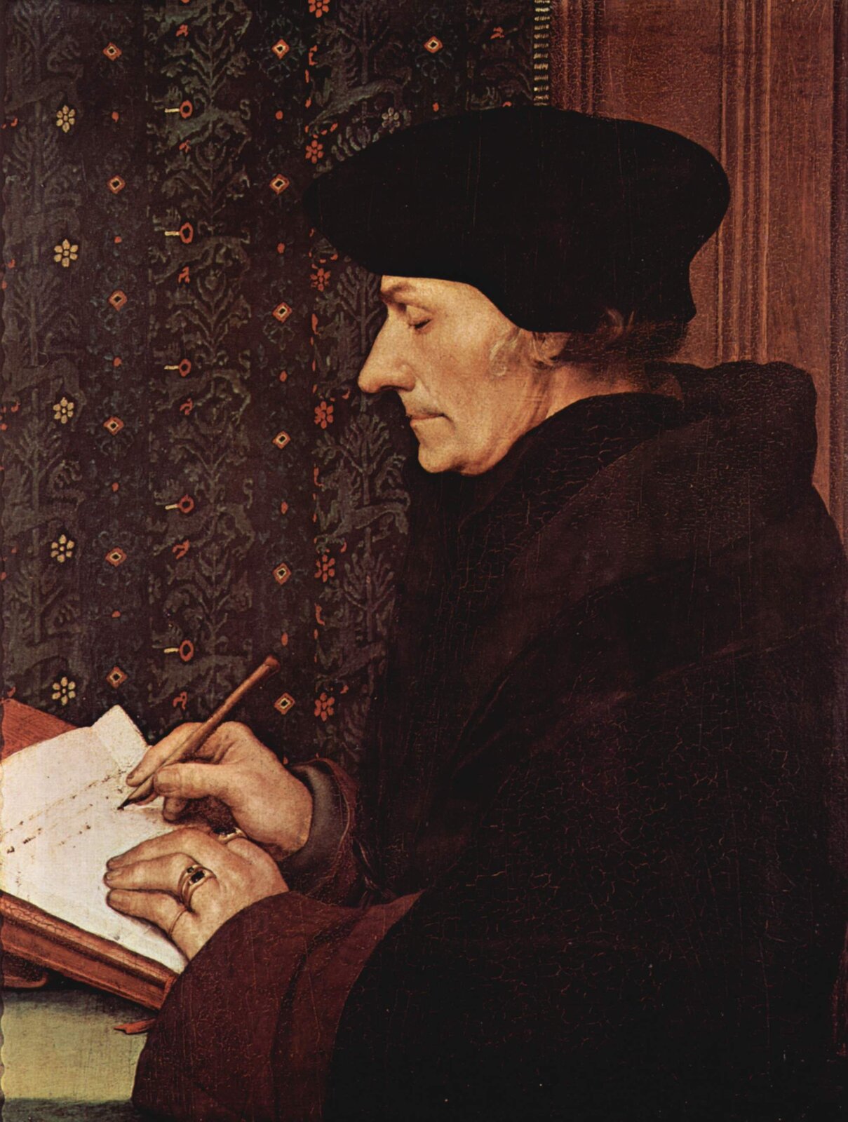 Obraz autorstwa Hansa Holbeina pt. portret Erazma z Rotterdamu przedstawia tytułowego mężczyznę, który pozuje na siedząco. Został on uwieczniony w czasie pracy nad dokumentem.  Mężczyzna ma na głowie czarną czapkę, ubrany jest w długą czarną szatę, w jednej dłoni trzyma pióro, drugą przytrzymuje kartkę papieru. 