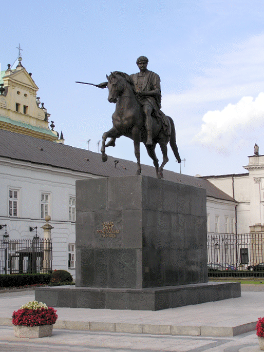 Zdjęcie przedstawia pomnik. Na dużym, wysokim postumencie znajduje się mężczyzna na koniu. Trzyma w prawej ręce miecz.