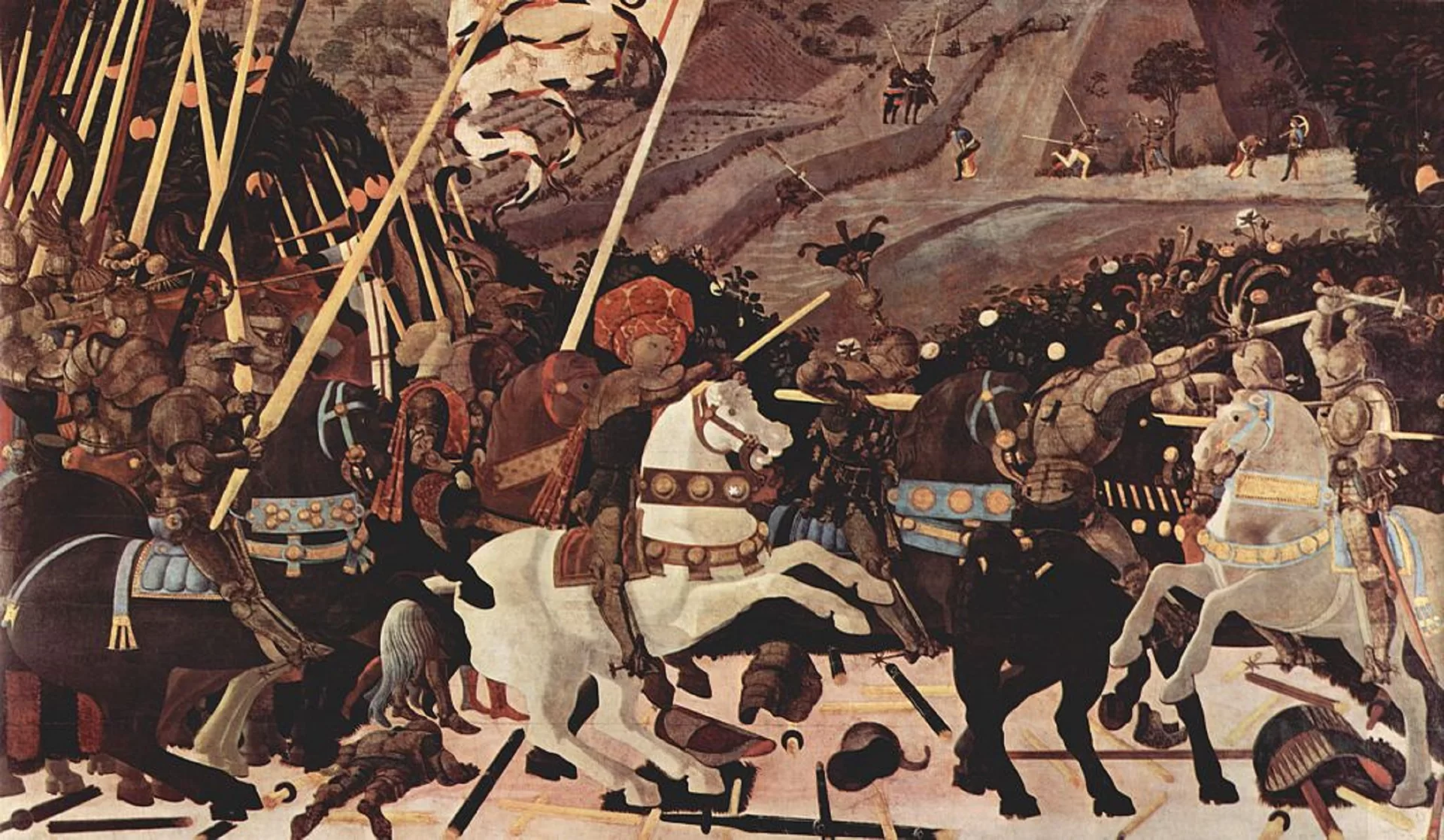 Ilustracja przedstawia obraz Paola Uccella „Bitwa pod San Romano”. W centralnej części obrazu, na białym koniu wojskami Florencji dowodzi - kondotier Niccolò da Tolentino, dosiadający białego, stającego dęba konia. Mężczyzna ma na sobie rycerską zbroję i turban. W prawej dłoni trzyma laskę dowódczą. Za nim, na koniach podąża grupa uzbrojonych w lance rycerzy. Jeden z nich trzyma sztandar. Pomiędzy rycerzami młodzieńcy dmą w trąby. Po prawej stronie pomiędzy wojskami toczy się walka. Scena rozgrywa się na tle wzgórza, na którym polują myśliwi. W oddali znajdują się dwaj rycerze na koniach.