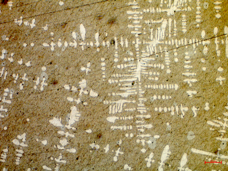 Mikrostruktura siluminu modyfikowanego AlSi11
Jasna faza α na tle ciemnej eutektyki α+Si. - powiększenie 10x