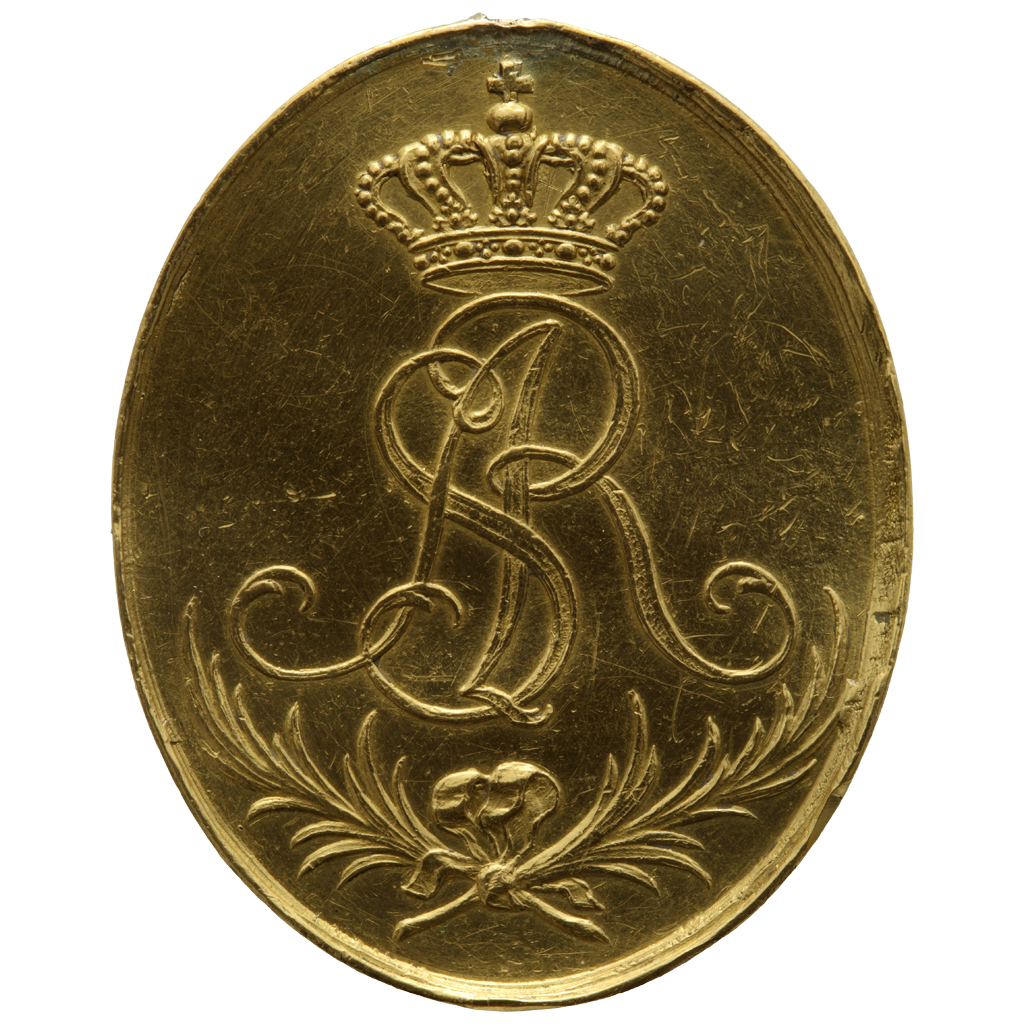 Ilustracja przedstawia Virtuti Militari. Order wykonany jest ze złota. Znajdują się na nim, na środku, dwie literki splątane ze sobą. Nad nimi jest korona a pod są dwie gałązki związane na środku ze sobą wstążką.