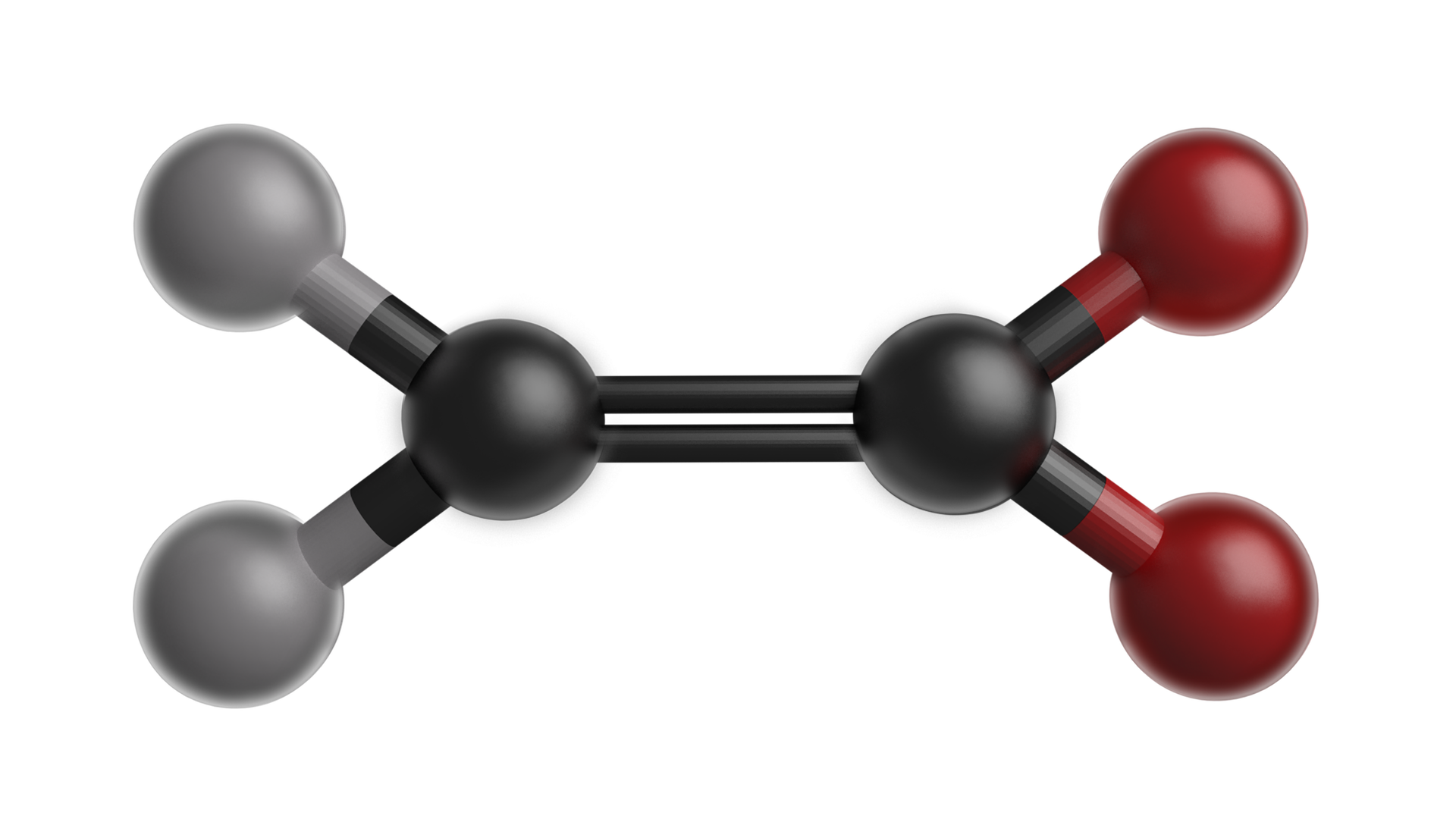 Na ilustracji jest model kulkowo‑pręcikowy. Dwie czarne kulki łączą się wiązaniem podwójnym. Kulka leżąca po lewej stronie łączy się po lewej stronie z dwiema szarymi kulkami. Czarna kulka leżąca po prawej stronie łączy się z dwiema czerwonymi kulkami. Położenie kulek jest symetryczne. 