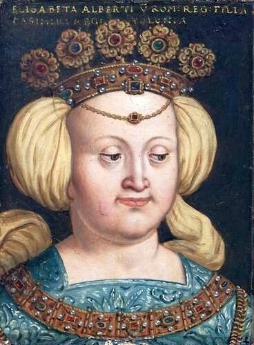 Małżonka Kazimierza Jagielończyka Elżbieta Rakuszanka z dynastii Habsburgów (portret z XVI wieku). Nazywano ją czasem matką królów. To określenie bierze się stąd, że czterej jej synowie zostali koronowani na królów Małżonka Kazimierza Jagielończyka Elżbieta Rakuszanka z dynastii Habsburgów (portret z XVI wieku). Nazywano ją czasem matką królów. To określenie bierze się stąd, że czterej jej synowie zostali koronowani na królów Źródło: Antoni Boys, 1579-1587, olej na desce, domena publiczna.