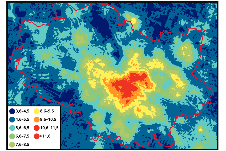 Mapa przedstawia rozkład temperatury powietrza we Wrocławiu. Centrum jest zaznaczone na czerwono, obrzeża miasta na niebiesko.  Kolor czerwony wskazuje na temperaturę powyżej 11,6 stopnia.