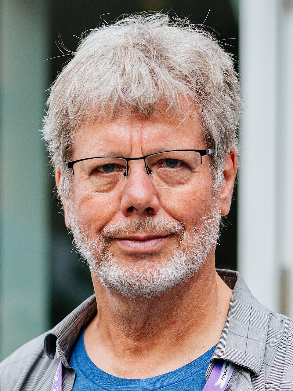 Zdjęcie przedstawia Guido van Rossum - twórcę języka Python