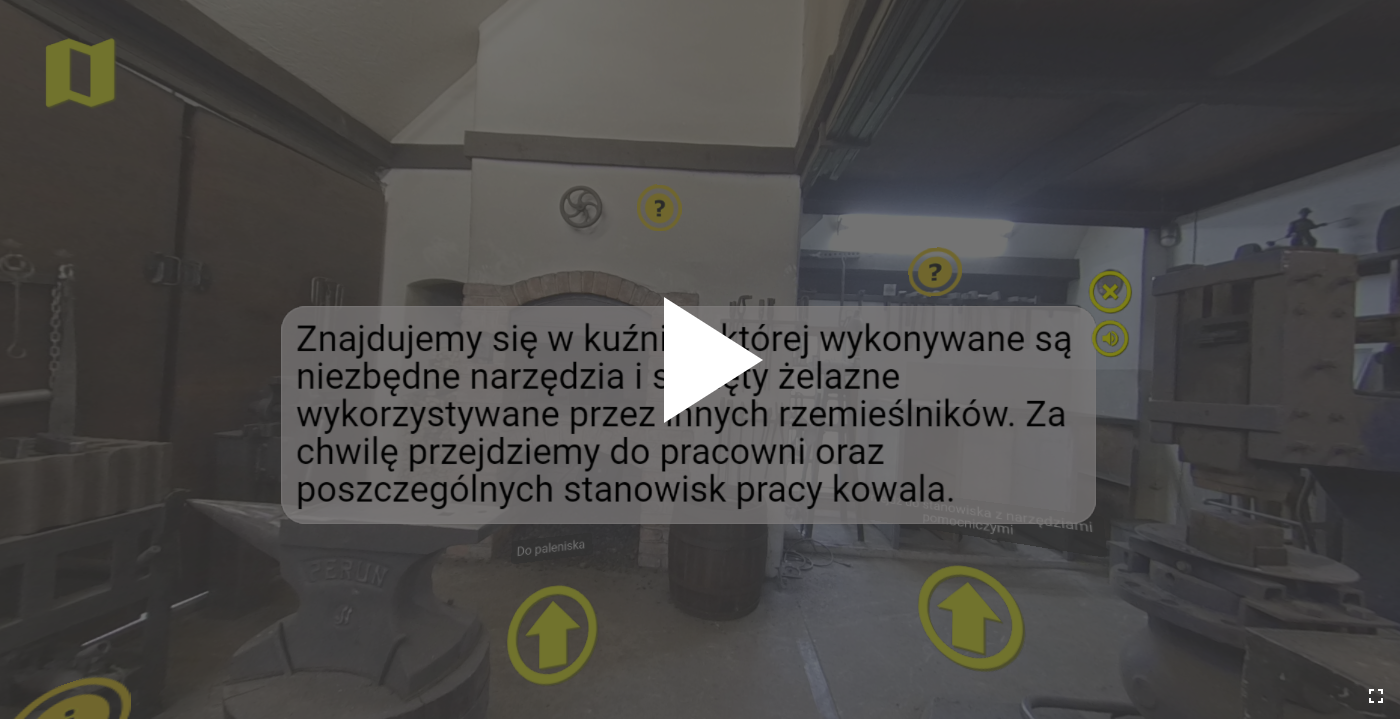 Wygląd przycisku do uruchamiania wirtualnej wycieczki. Jest to kadr z filmu z trójkątnym, białym przyciskiem umieszczonym pośrodku. Przycisk ten uruchamia odtwarzanie filmu.