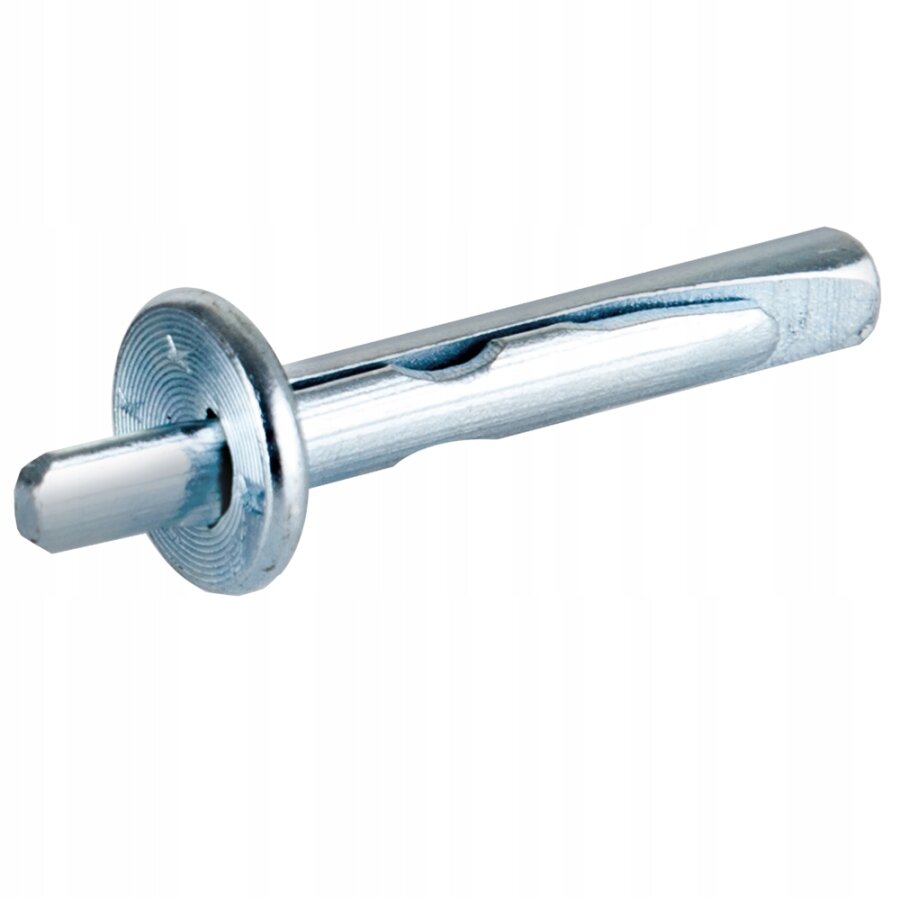 Na zdjęciu ukazano kotew. Element ten ma postać stalowego pręta z okrągłą nakładką.