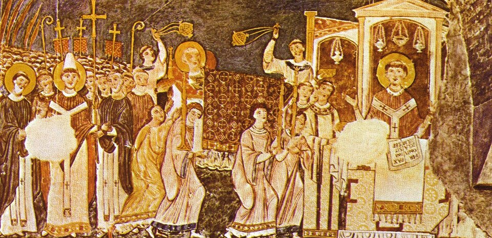 Ilustracja przedstawia tłumną delegację duchownych u dostojnika kościelnego. Mężczyzna po prawej stronie zasiada na tronie, jego głowę otacza aureola. Do papieża w kolejce na audiencję ustawiają się kolejni przybysze. Wszyscy to mężczyźni ubrani w sutanny lub bardziej strojne ornaty liturgiczne. Nad głowami zebranych górują wysokie krzyże, które trzymają w dłoniach.