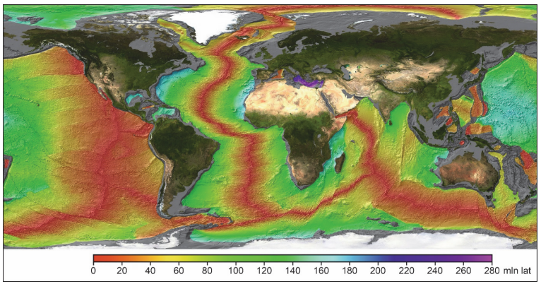 Mapa świata przedstawiająca wiek skorupy oceanicznej (skał bazaltowych) na dnie oceanów, wyrażony w milionach lat za pomocą skali barwnej. Na środku Oceanu Atlantyckiego, Indyjskiego oraz we wschodniej części Oceanu Spokojnego ciągną się długie, czerwone pasy oznaczające najmłodszą skorupę oceaniczną (w wieku bliskim 0 milionów lat), która pokrywa się z przebiegiem grzbietów śródoceanicznych i stref ryftowych. W miarę oddalania się od tych osi barwa płynnie zmienia się przez żółtą i zieloną aż po niebieską i fioletową, co oznacza coraz starsze skały. Najstarsze fragmenty dna oceanicznego (w fioletowym kolorze, o wieku dochodzącym do 280 milionów lat) znajdują się najdalej od grzbietów, blisko krawędzi kontynentów, m.in. w północno‑zachodnim Atlantyku oraz w zachodnim Pacyfiku.