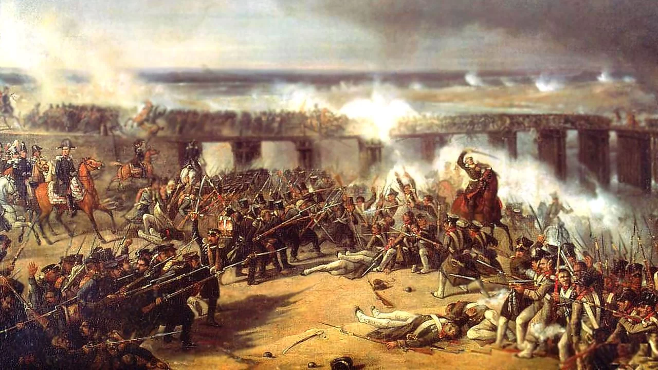 Obraz przedstawia scenę bitwy nad rzeką. Na lewym jej brzegu, z od lewej strony rosyjska piechota z bagnetami szturmuje polskie pozycje obronne. Część żołnierzy jest już w zwarciu. Za plecami piechoty zarówno polskiej i rosyjskiej widać widać kliku konnych. Wśród walczących leżą zwłoki. Na drugim planie widać most po którym przemieszczają się żołnierze. W oddali przy prawej krawędzi obrazu widać płonące miasto. Znad którego płyną kłęby dymu.