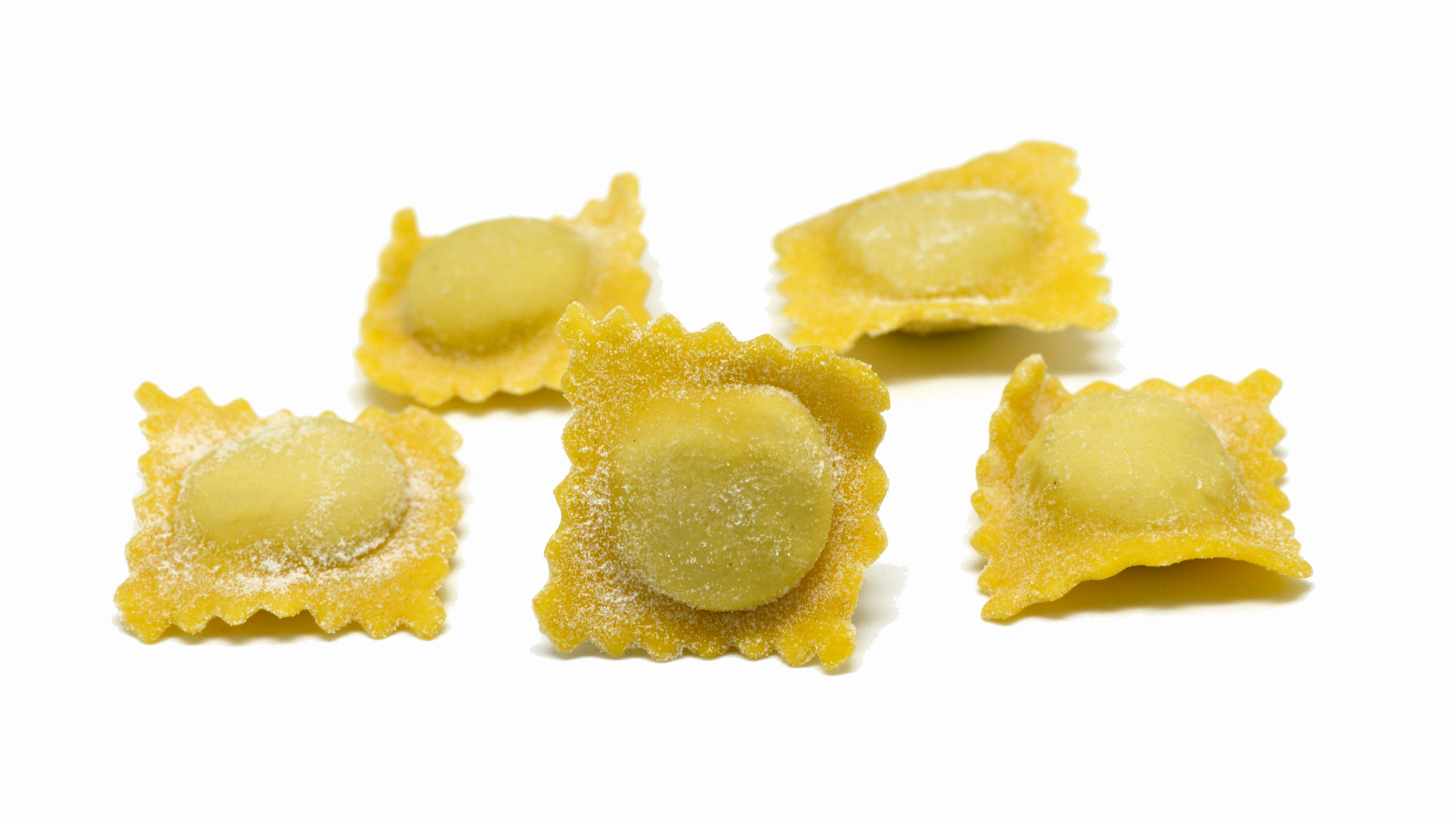 Zdjęcie przedstawia pięć małych, włoskich pierożków.