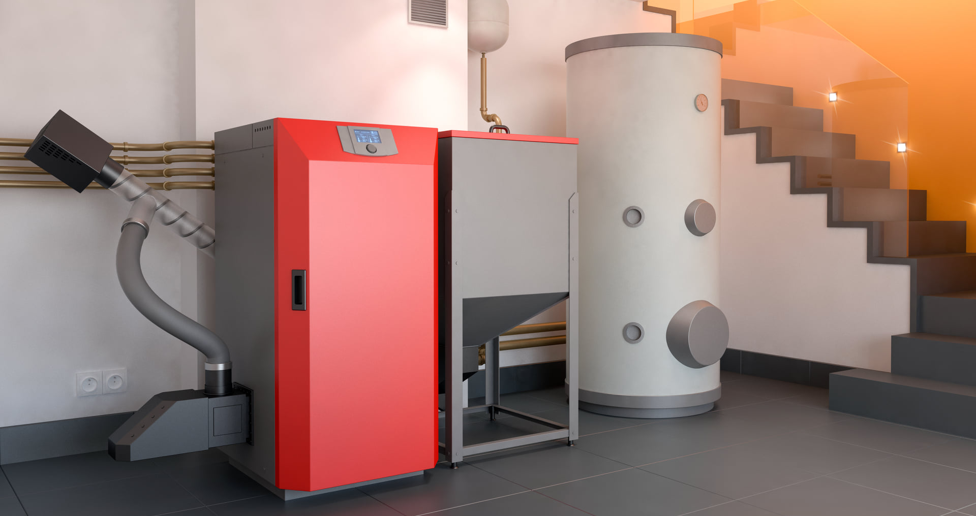 Grafika przedstawia kocioł na biomasę zamontowany w piwnicy nowoczesnego domu. Urządzenie jest dość sporych rozmiarów. Kocioł posiada estetyczną obudowę z panelem sterującym umieszczonym w górnej części oraz zasobnikiem na paliwo znajdującym się po prawej stronie. Na prawo od kotła ustawiono duży zbiornik na wodę w kształcie walca.