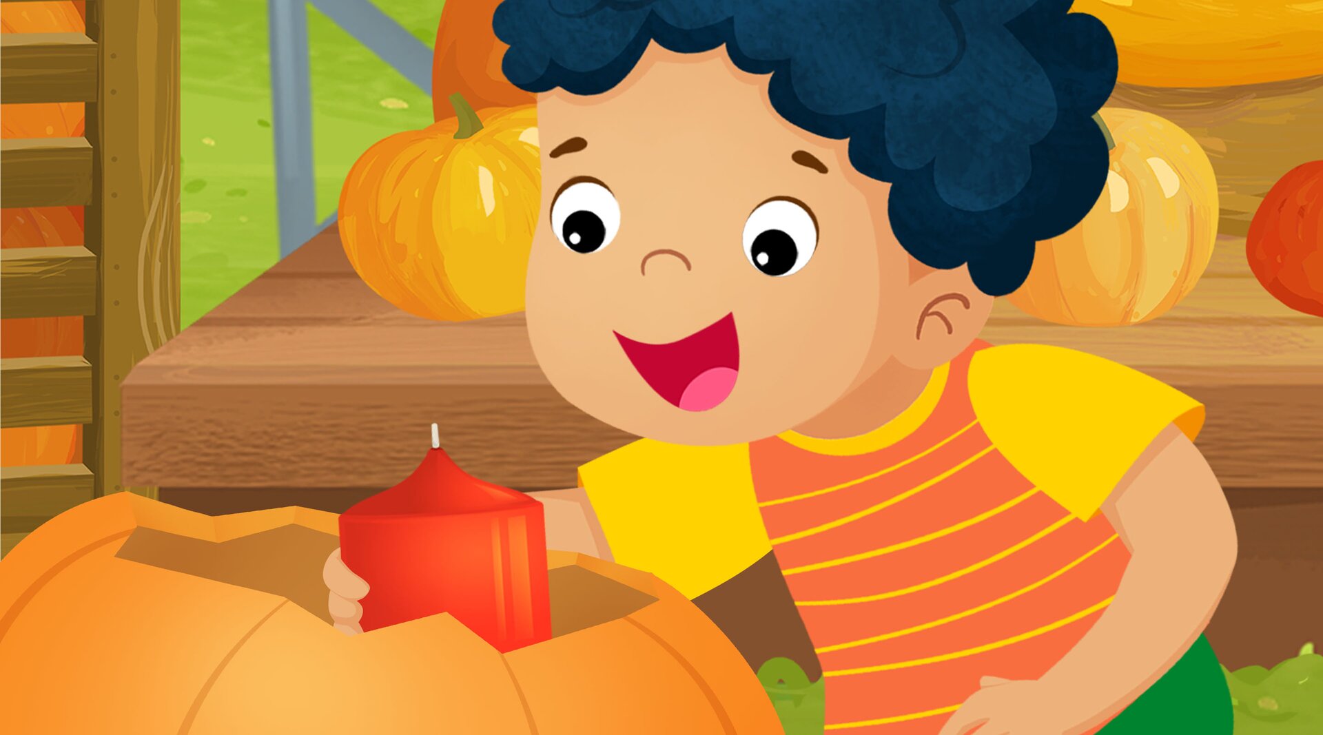 Na ilustracji znajduje się chłopiec wkładający świecę do dyni.
