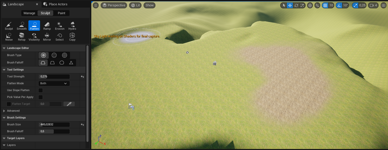 Ilustracja przedstawia zrzut ekranu - panel programu  Unreal Engine . Widoczny jest ekran z rozległą płaszczyzną w kolorze zielono - beżowym. W perspektywie widoczny jest uskok terenu , a za nim pofalowana, zielona płaszczyzna. W lewym dolnym rogu widać niewielką, białą flagę, mniej więcej pośrodku ekranu szary punkt, a wyżej, w lewą stronę symbol różdżki. W lewym górnym rogu widać szare koło obwiedziony konturami okręgów o większej średnicy. Pod okręgiem widoczny jest napis:  Sky Light waiting on Shaders for final capture . Na górze ilustracji znajdują się ułożone w rzędzie symbole graficzne, a lewej strony lista menu z następującymi opcjami: dwie zakładki:  Landscape  i  Place Actors , trzy opcje z wybraną opcją środkową:  Manage, Sculpt, Paint , a pod spodem dwa szeregi ikonek z podpisami. Wybrana jest trzecia ikonka w górnym rzędzie z symbolem okręgu narysowanego przerywaną linią, a pod nim płaskiego trapezu i podpisem  Flatten . Poniżej, w kolejnych linijkach znajdują się grupy opcji menu: pierwsza z nich to  Landscape Editor  z opcjami:  Brush Type:  - wybrana jest tu ikonka koła obwiedzionego okręgiem większej średnicy oraz  Brush Falloff  z wybraną ikonką przypominającą trapez z zaokrąglonymi górnymi rogami; druga z nich to:  Tool Settings  z opcjami:  Tool Strength:  i wpisaną wartością 0,276,  Flatten Mode: Both  i trzy odznaczone opcje:  Use Slope Flatten, Pick Value Per Apply  i  Flatten Target ; trzecia grupa opcji menu to:  Advanced ; czwarta grupa opcji menu to:  Brush Settings  z opcją:  Brush Size  i wpisaną wartością 445,02832,  Brush Falloff  i wpisaną wartością 0,5 oraz odznaczoną opcją:  Use Clay Brush ; piąta grupa opcji menu to:  Target Layers , a szósta  Layers . 