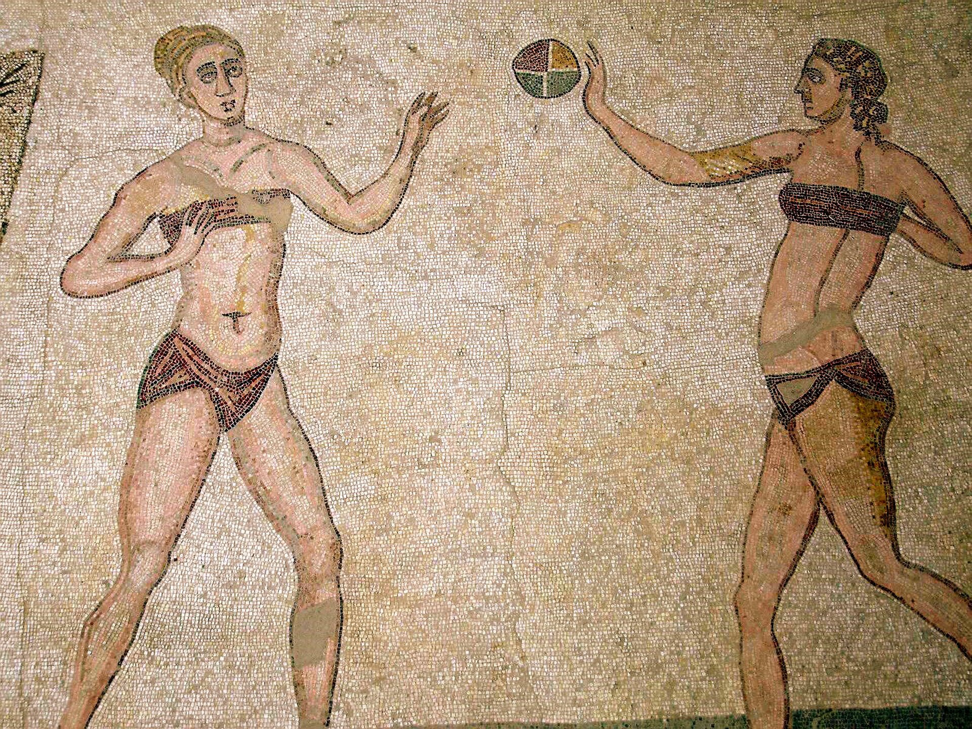 Ilustracja przedstawia starożytną mozaikę ukazująca grę w piłkę ręczną.