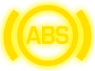 Ilustracja przedstawia zapis dużymi literami ABS, litery są w żółtym okręgu. Po lewej i prawej stronie okręgu są półokręgi. 