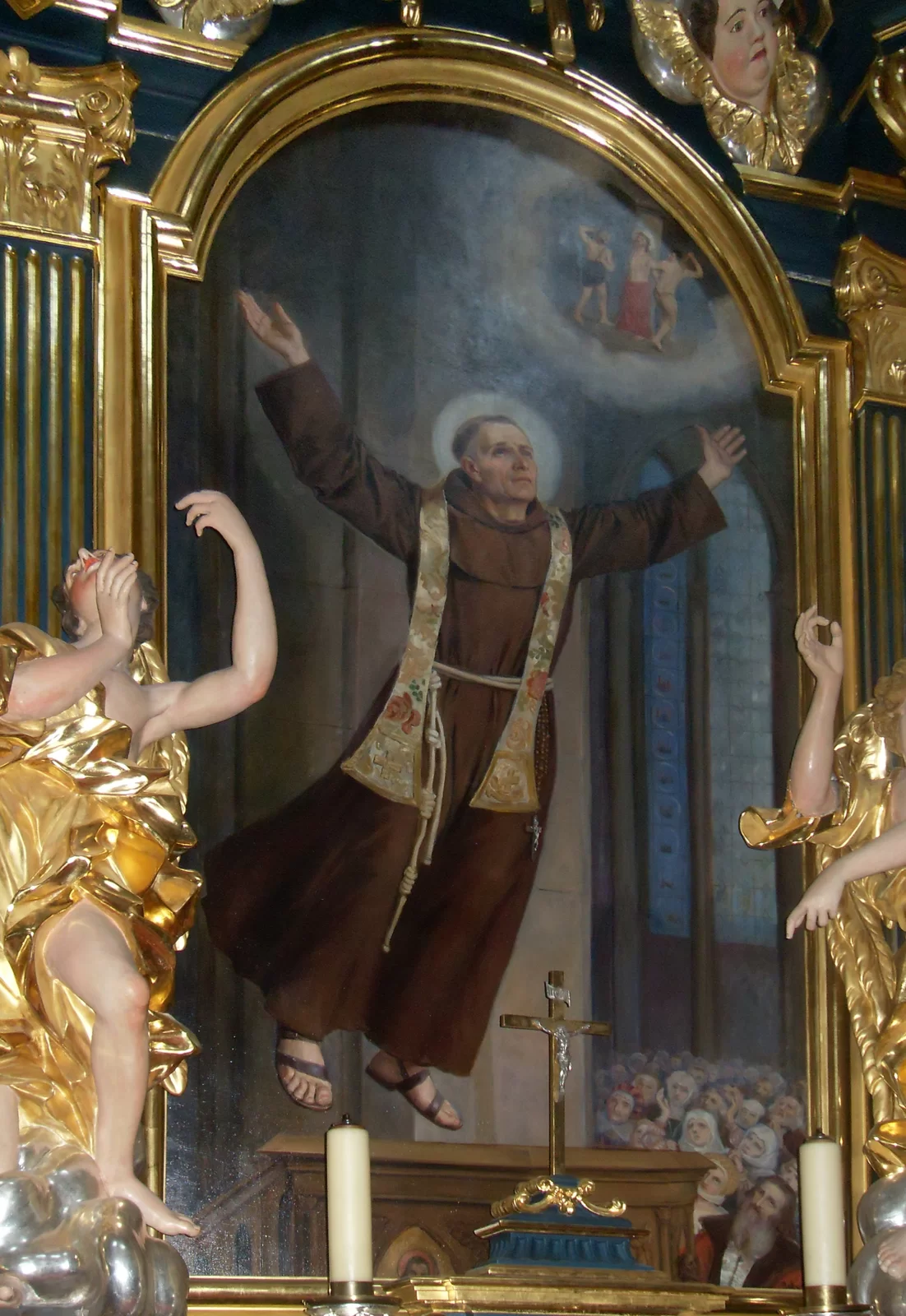 Ilustracja przedstawia dzieło, na którym znajduje się Władysław z Gielniowa - polski poeta-pieśniarz średniowieczny, kaznodzieja, błogosławiony Kościoła katolickiego. Mężczyzna jest namalowany w pozycji stojącej, ręce ma uniesione ku górze. Ubrany jest w brązową szatę.