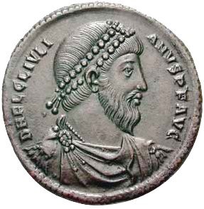 Ilustracja przedstawia awers monety, na którym widać portret mężczyzny z brodą i laurem na głowie patrzącego w prawą stronę