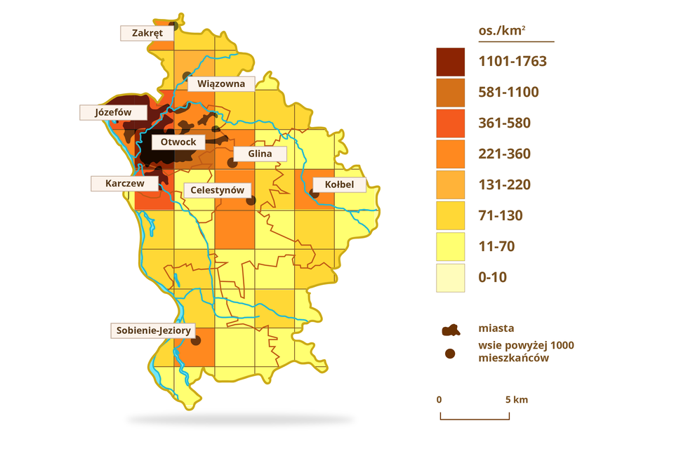 Na ilustracji przedstawiono przykład kartogramu. Jego polem odniesienia jest siatka geometryczna skonstruowana z kwadratów. Siatka ta obrazuje gęstość zaludnienia powiatu otwockiego w 2011 roku. Mapa powiatu ma kształt nieregularnego wielokąta. Nieregularna figura jest podzielona na kilka mniejszych nieregularnych wielokątów. Oznaczają one gminy wchodzące w skład powiatu otwockiego. Każda gmina jest oddzielona od drugiej linią koloru zbliżonego do brązowego. Ponadto na mapie zaznaczone są zbiorniki wodne - rzeki i jeziora koloru niebieskiego. Punktami w kolorze brązowym zaznaczone są miasta i wsie powyżej 1000 mieszkańców i podpisane w małych prostokątach koloru białego. Mapa powiatu jest podzielona dodatkowo na kwadraty tej samej wielkości. Każdy z nich jest zamalowany na taki kolor, jaka jest gęstość ludności na danym terenie. Według legendy umieszczonej po prawej stronie od mapy, czym ciemniejszy kolor, tym większe zaludnienie na kilometr kwadratowy. Kolory jasne typu biały, odcienie żółtego informują, że zagęszczenie ludności jest mniejsze. Odcienie pomarańczowego i brązu informują, że gęstość zaludnienia na obszarze wyznaczonym przez dany kwadrat jest większa. Z legendy można odczytać, że największa gęstość zaludnienia dotyczy okolic Józefowa, Otwocka, Karczewa - od 1101 do 1763 osób na kilometr kwadratowy. Okolice Celestynowa, Kołbieli, Gliny, Zakrętu, Sobienie‑Jeziory mają gęstość zaludnienia od 221 do 360 osób na kilometr kwadratowy. Rejon Wiązowny od 131 do 220 osób na kilometr kwadratowy.    