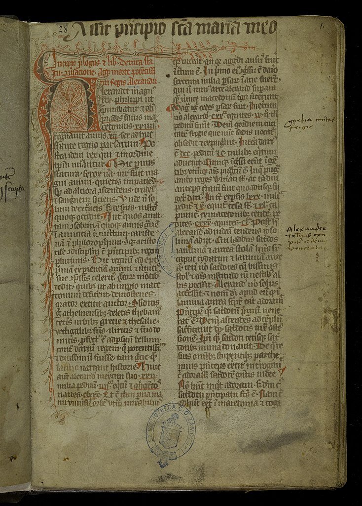 Fotografia barwna przedstawiająca fragment Kroniki Galla Anonima. Ilustracja przedstawia jedną stronę książki. Tekst jest zapisany odręcznie, w dwóch kolumnach. 