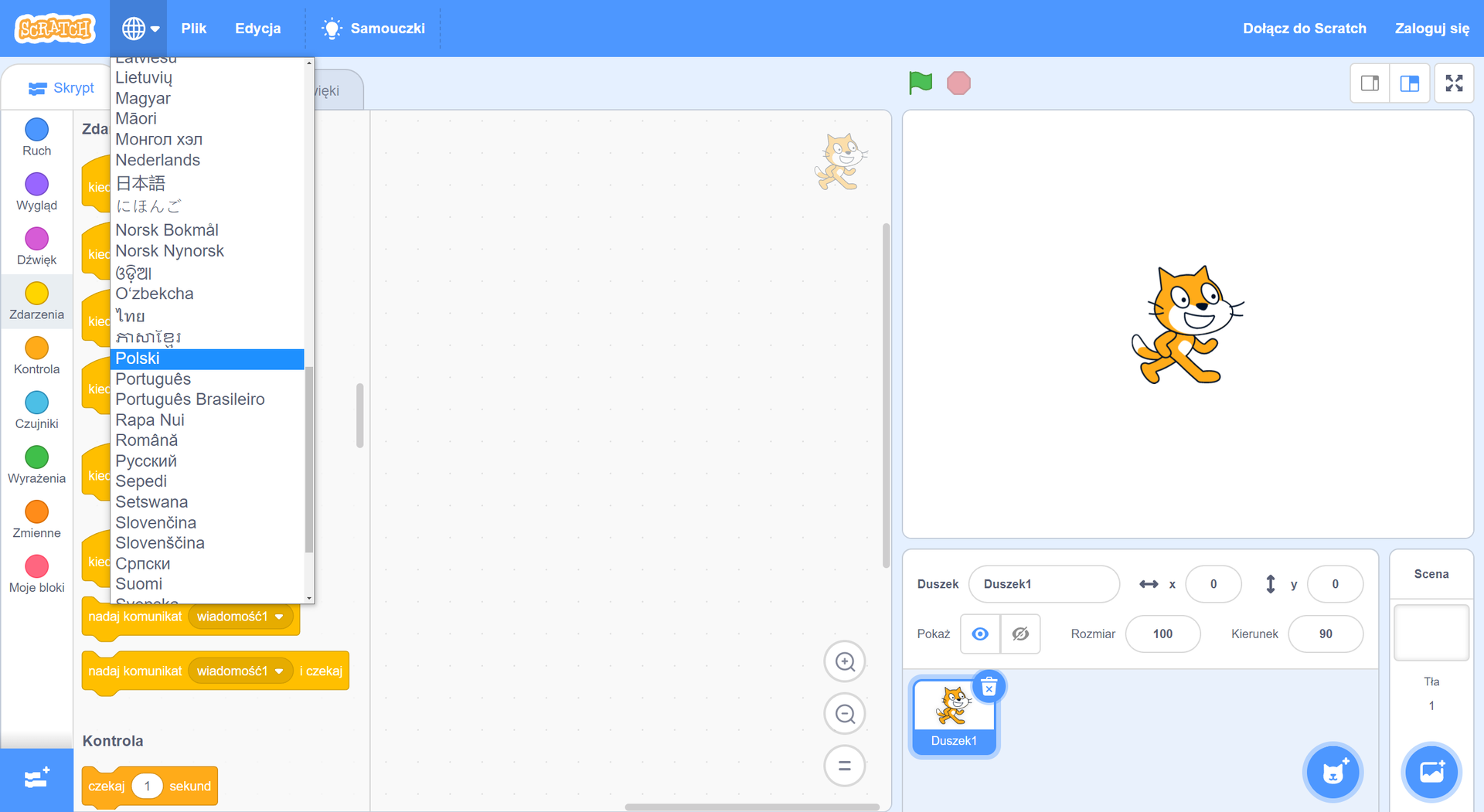 Zrzut okna środowiska Scratch z rozwiniętą listą dostępnych języków. Na górnym pasku w lewym górnym roku znajduje się logo Scratch, obok jest globus, pod którym jest rozwinięta lista języków do wyboru, z zaznaczonym językiem polskim. Obok znaku globusa znajdują się etykiety: "Plik", "Edycja", "Samouczki". W prawym górnym rogu znajdują się etykiety: "Dołącz do Scratcha", "Zaloguj się".