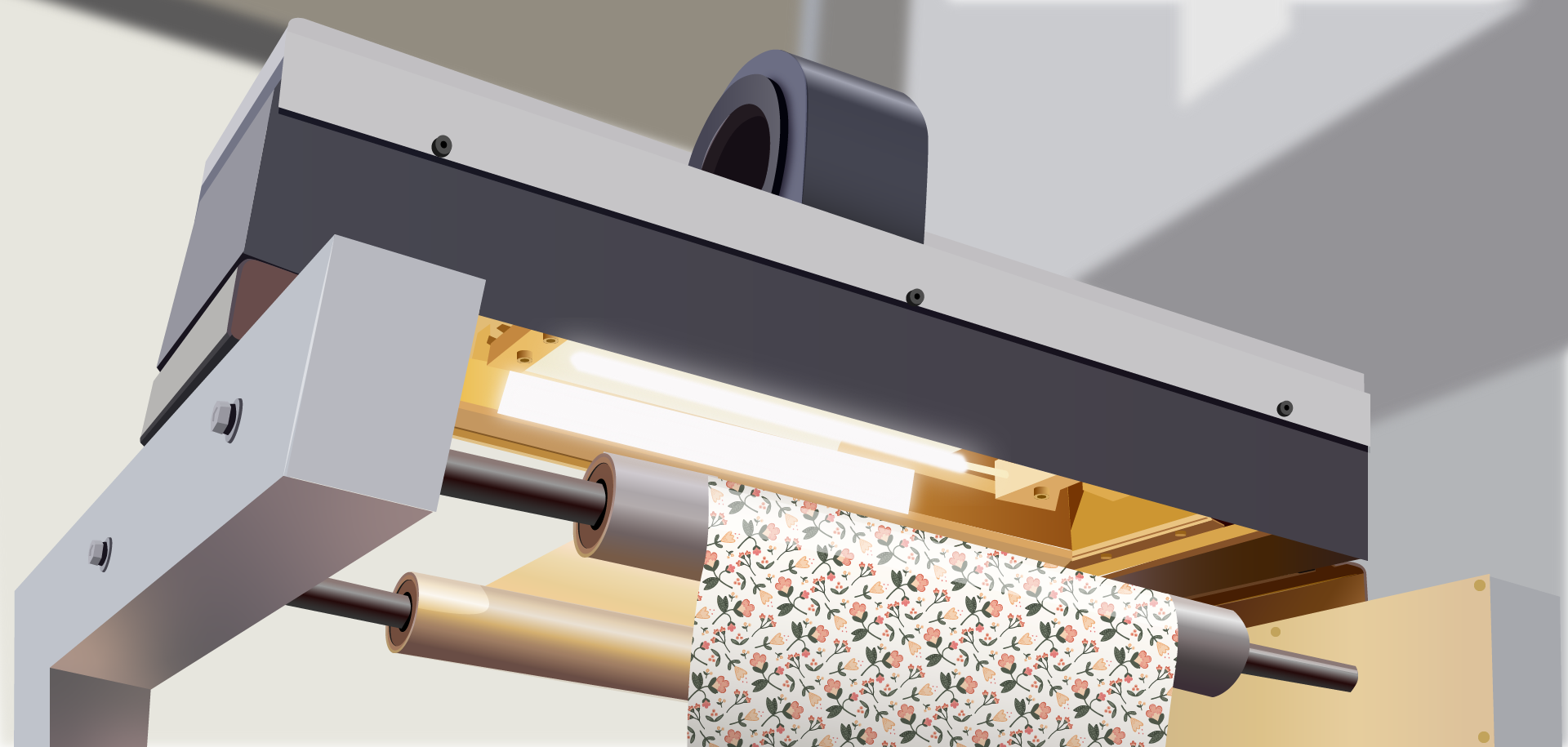 Grafika przedstawia system suszenia farby w maszynie fleksograficznej do bibuły. Widoczna jest pozioma listwa, poniżej której znajduje się jasne pole – źródło światła, umocowana na l‑kształtnym ramieniu. Poniżej dwie poziome rolki, na pierwszej znajduje się zadrukowana bibuła poddawana suszeniu.