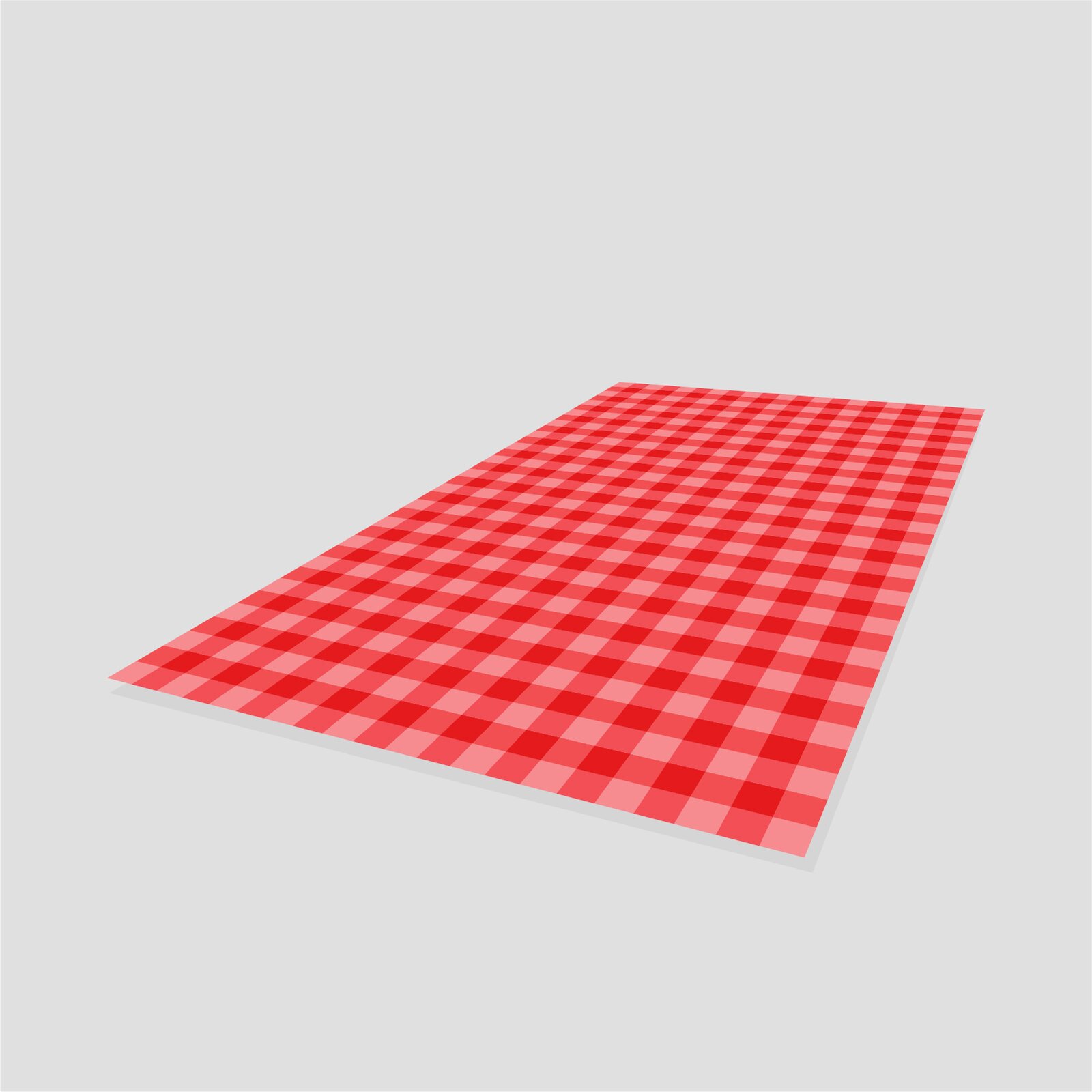 Na ilustracji koc w czerwono‑różową kratę.