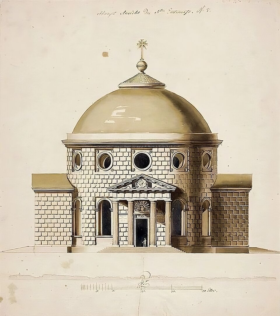 Kliknij, aby powiększyć Ilustracja przedstawia wygląd północnej fasady kościoła w formie rotundy. Świątynia nakryta jest kopułą. Na jej szczycie znajduje się krzyż. Rotunda ujęta jest czterema niskimi, symetrycznie rozmieszczonymi aneksami, z których jeden stanowi portyk wejściowy. Jest on wsparty na czterech kolumnach i nakryty trójkątnym frontonem. Elewacja kościoła podzielona jest na dwie kondygnacje i ozdobiona boniowaniem. Ściany kościoła zdobią duże okna zamknięte półkoliście, które znajdują się w dolnej kondygnacji oraz okna koliste rozmieszczone pod kopułą.
