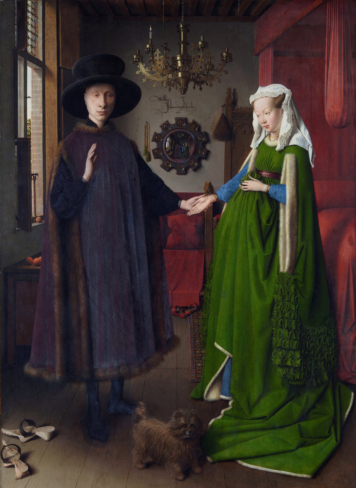 Obraz Jana van Eycka pod tytułem „Portret małżonków Arnolfini” przedstawia kobietę i mężczyznę trzymających się za ręce. Kobieta ma na sobie długą zieloną suknię a na głowie białą chustę. Mężczyzna ubrany jest w granatowy kożuch buty takiego samego koloru oraz czarny kapelusz. Pomiędzy parą znajduje się mały brązowy pies. Postacie na obrazie znajdują się w sypialni. 
