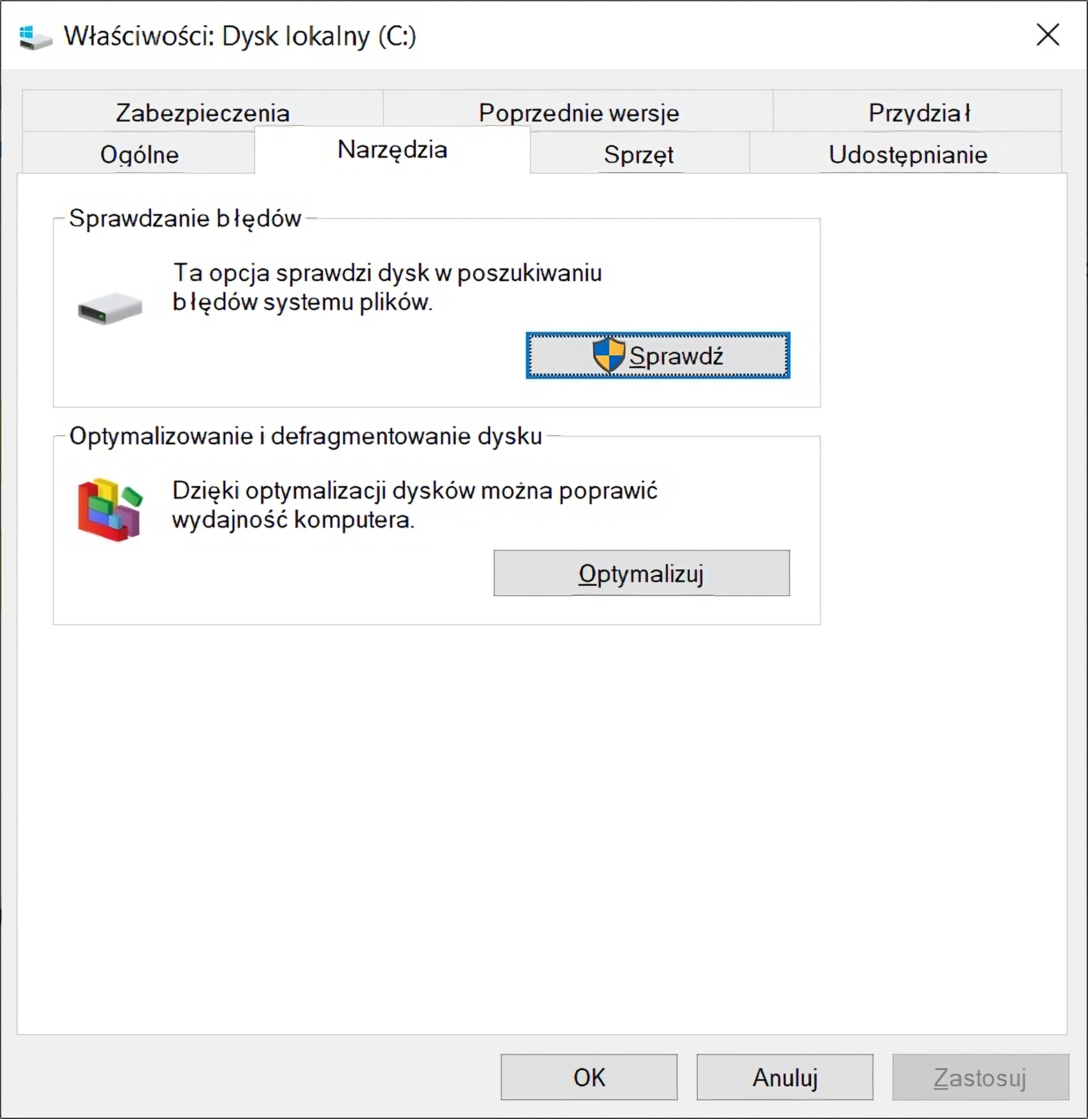 Ilustracja przedstawia okno Właściwości: Dysk lokalny C systemu Windows. U góry znajdują się zakładki: Zabezpieczenia, Poprzednie wersje, Przydział, Ogólne, Narzędzia, Sprzęt, Udostępnianie. Wybrana została zakładka Narzędzia, na której znajdują się dwie opcje: Sprawdzanie błędów oraz Optymalizowanie i defragmentowanie dysku.