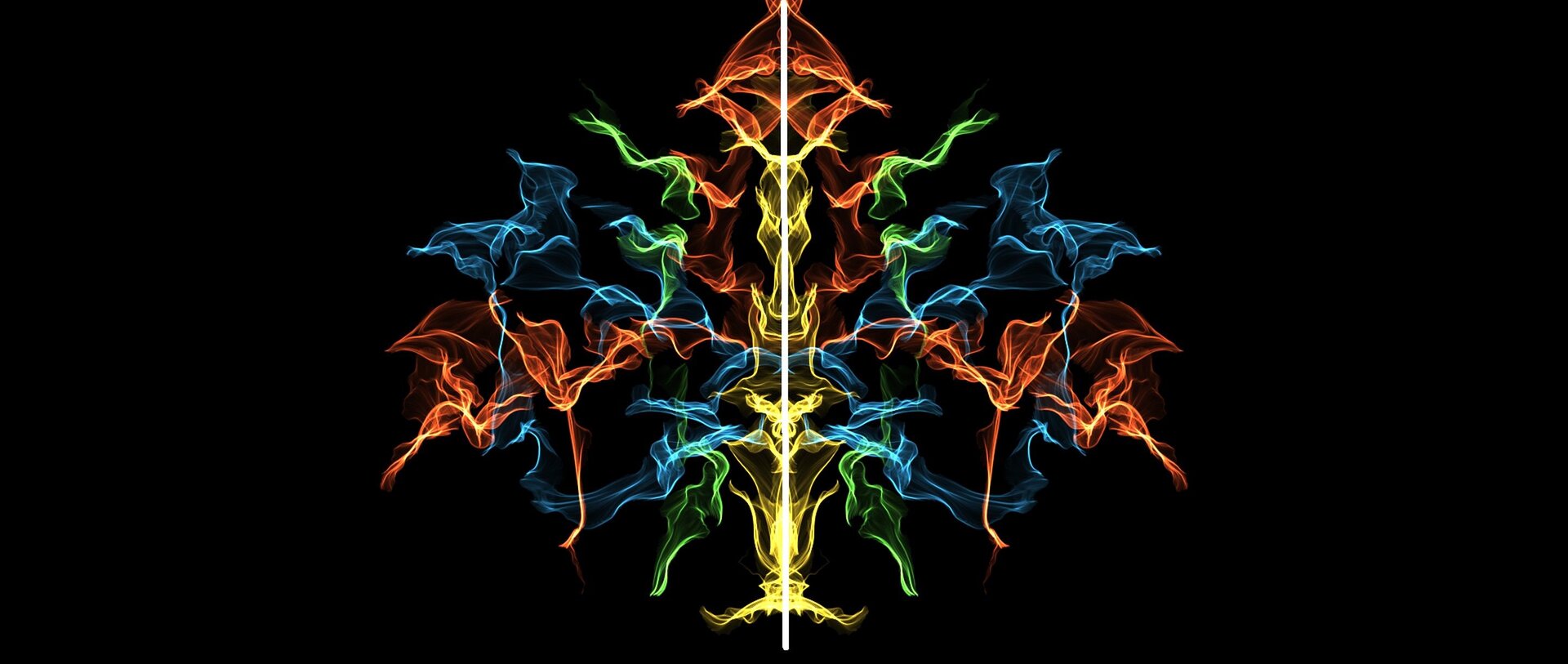 Na ilustracji przedstawiono obrazek z neonowych linii na czarnym tle, który posiada oś symetrii.