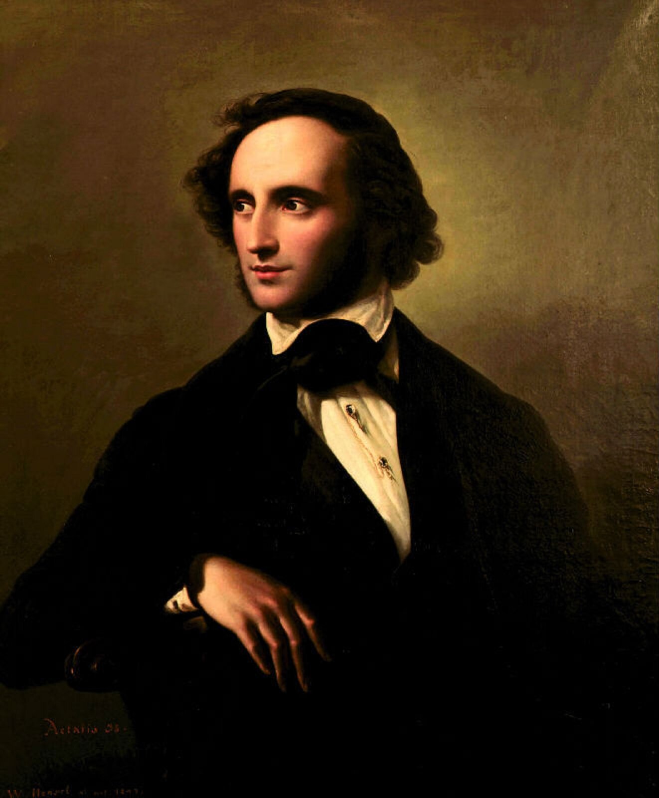 Ilustracja przedstawia obraz Wilhelma Hensela pt. „Portret Felix Mendelssohn-Bartholdy”. Na obrazie znajduje się mężczyzna w ciemnych włosach. Ubrany jest w jasną koszulę oraz ciemny garnitur. Pod szyją widoczna jest także ciemna chusta. Mężczyzna spogląda w lewą stronę. Jedną rękę trzyma na oparciu krzesła.