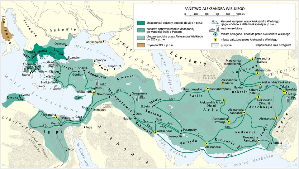 Ilustracja przedstawia Państwo Aleksandra Wielkiego.  Macedonia i obszary podbite do 334 r. p.n.e. obejmowały teren południowej Bułgarii i Grecji. Państwa sprzymierzone z Macedonią do wspólnej walki z Persami  to północna Libia oraz część Grecji.  Obszary podbite przez Aleksandra Wielkiego do 326 r. p.n.e. obejmowały teren obecnej Turcji i Iranu.  Rzym do 327 r p.n.e. zajmował tren środkowego Rzymu. Kierunki kampanii wojsk Aleksandra Wielkiego i jego wodzów z datami ekspansji. Początek miał miejsce w mieście Pella w 334 r. p.n.e. przez Sardes, Milet, Halikarnas do Aleksandrii oraz Gordion. Z Ankyra do Issos, Tyr, Gaza, Peluzjum, Memfis, Aleksandria (na północy Afryki) dalej do Memfis w 332 r. p.n.e., Damaszek, Nikeforion w 331 r. p.n.e. do Gaugamela, Opis w 331 r. p.n.e. Suza w  330 r. p.n.e. Persepolis. Z Persepolis w 334 r. p.n.e. do Suza, w 330 r. p.n.e. Ekbatana, Hekatompylos, Aleksandropolis, Aleksansrię Arion (Herat), Aleksandria Profaza, Aleksadria Kandahar. Z Aleksanrii Kahdar w 328 r. p.n.e. do Aleksrandrii Z Pattala w 326 r. p.n.e. do Aleksandrii (przy Babilonii). Z Aleksandrii (przy Babilonii) w 329 r p.n.e. do Aleksandrii (Ghazni) do Kabura (Kabul), Baktra, Marakanda (Samarkanda), Aleksandria Eschate, Aleksandria, Baktra, Aleksandria Kaukaska. W 327 r. p.n.e. do Bukefala, Nikaja, Aleksandria i w 326 r. p.n.e. z powrotem do Pattala.  Ważne bitwy Gaugamela 331 r. p.n.e., Issos 333 r. p.n.e., Nikaja 326 r. p.n.e., Cheronea 338 r. p.n.e., Granik 334 r. p.n.e.   Miasta oblegane i zdobyte przez Aleksandra Wielkiego to Baktra, Gaza, Milet, Halikarnas. Miasta założone przez Aleksandra Wielkiego : Nikaja, Bukefala, Aleksandria Kaukaska, Aleksandria, Aleksandria Eschate, Aleksandria Merw, Aleksandropolis, Aleksandria Arion (Herat), Aleksandria Kandahar, Aleksandria Profazja, Aleksandria Rambakia, Aleksandria, Nikeforion, Aleksandria (przy Babilonie). Pustynie : Pustynia Kara- Kum, Pustynia Thar, Pustynia Syryjska, Pustynia Zachodnia (Libijska).   
