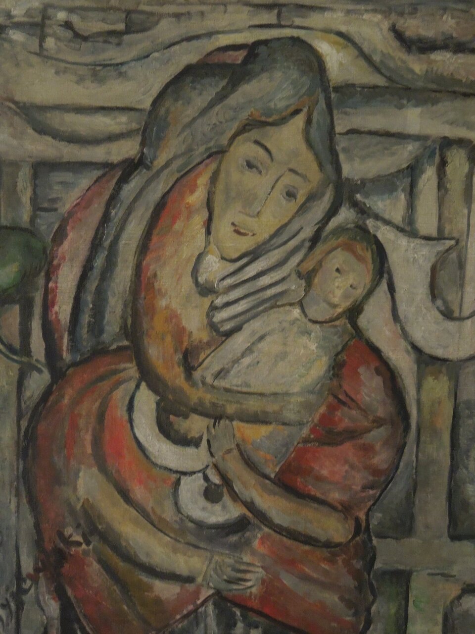 Ilustracja: Tytus Czyżewski, „Madonna”. Obraz przedstawia kobietę trzymająca na rękach dziecko. Twarz kobiety jest pociągła z lekkim uśmiechem. Wszystko przedstawione w szarych rozmytych barwach z lekkim zabarwieniem czerwienią.