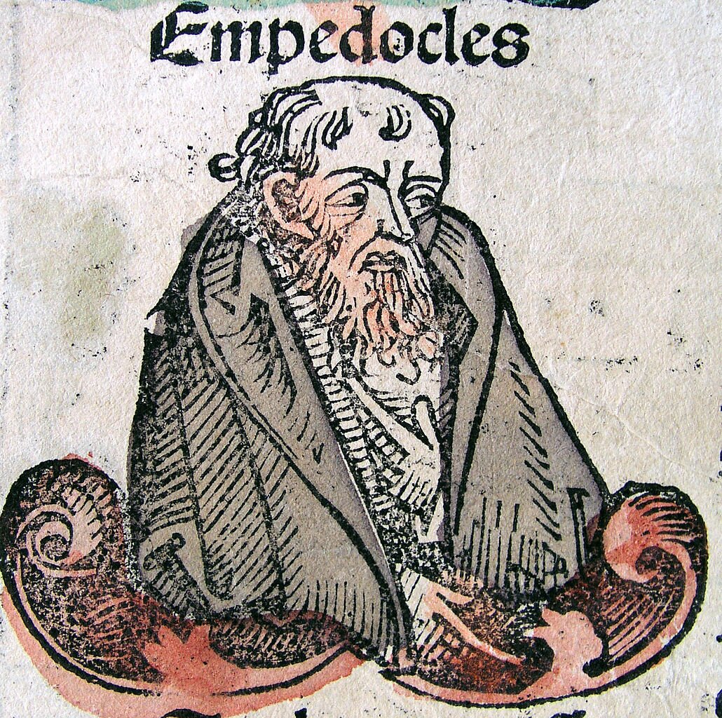 Ilustracja przedstawia postać Empedoklesa. Jest to stary, łysiejący mężczyzna, z długą, gęsta brodą. Mężczyzna ma na sobie obszerne szaty.
