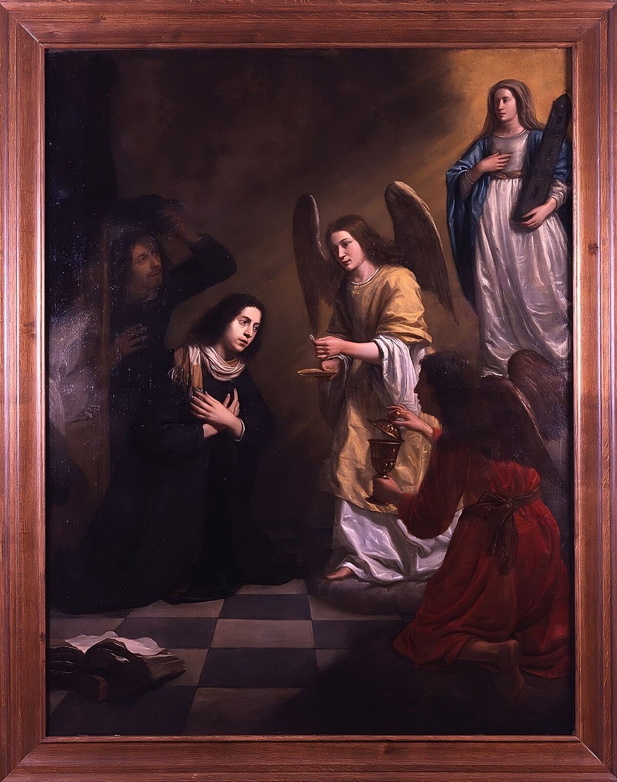 Obraz przedstawia Stanisława Kostkę przyjmującego komunię od aniołów. Po lewej stronie, na czarno‑białej posadzce, klęczy Stanisław Kostka ubrany w ciemne szaty, z żółto‑białym szalem na szyi, ramionami skrzyżowanymi na piersiach i średniej długości ciemnymi włosami. Z tyłu po prawej, ukryty za częścią ledwo widocznego łóżka, stoi mężczyzna zdejmujący kapelusz. Na pierwszym planie po lewej leży zamknięta a na niej otwarta księga. Po prawej stronie anioł ubrany w długie biało‑żółte szaty przekazuje Stanisławowi Hostię, trzymając ją nad pateną. Na pierwszym planie po prawej stronie klęczy anioł ubrany w czerwoną szatę, w dłoniach trzyma cyborium, z którego unosi wieko. Nad nim w snopie promieni św. Barbara ubrana w białą tkaninę z niebieskim płaszczem, i jej atrybutem, wieżą kościelną, opartą na prawym ramieniu. Tło jest ciemne.