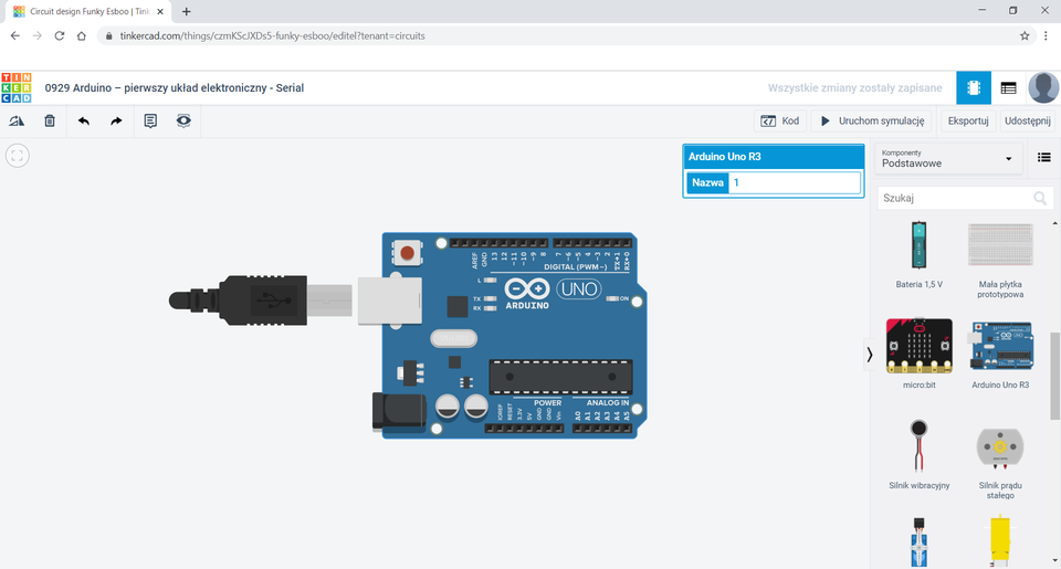 Na zrzucie ekranu przedstawione jest środowisko Tinkercad. Ponad obszarem roboczym znajduję się tytuł: 0929 Arduino – pierwszy układ elektroniczny - Serial. W obszarze roboczym znajduje się płytka Arduino. Obok niej okno Arduino Uno 3, gdzie znajduje się pole Nazwa z wpisaną wartością 1. Po prawej okno z kompletami.