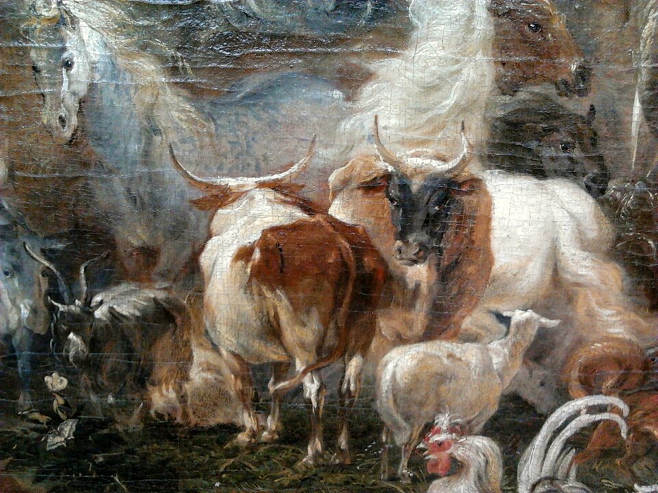 Obraz przedstawia gromadę zwierząt. Widoczny jest biały koń z grzywą, koza, krowy, owca, kogut z czerwonym dziobem i białym ogonem. 