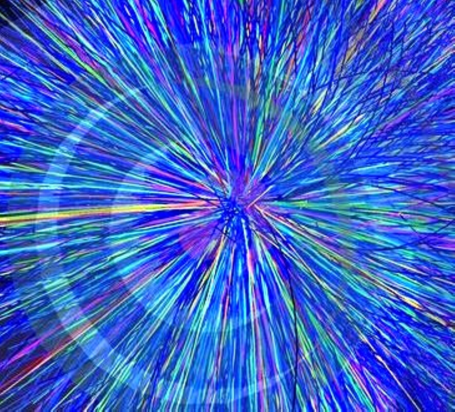 Rys. 3a. Ilustracja pokazuje symboliczne przedstawienie zderzenia cząstek w detektorze Alice poprzez różnobarwne linie wychodzące z punktu centralnego i rozchodzące się na wszystkie strony. Linii jest bardzo dużo i wiele z nich zlewa się ze sobą.