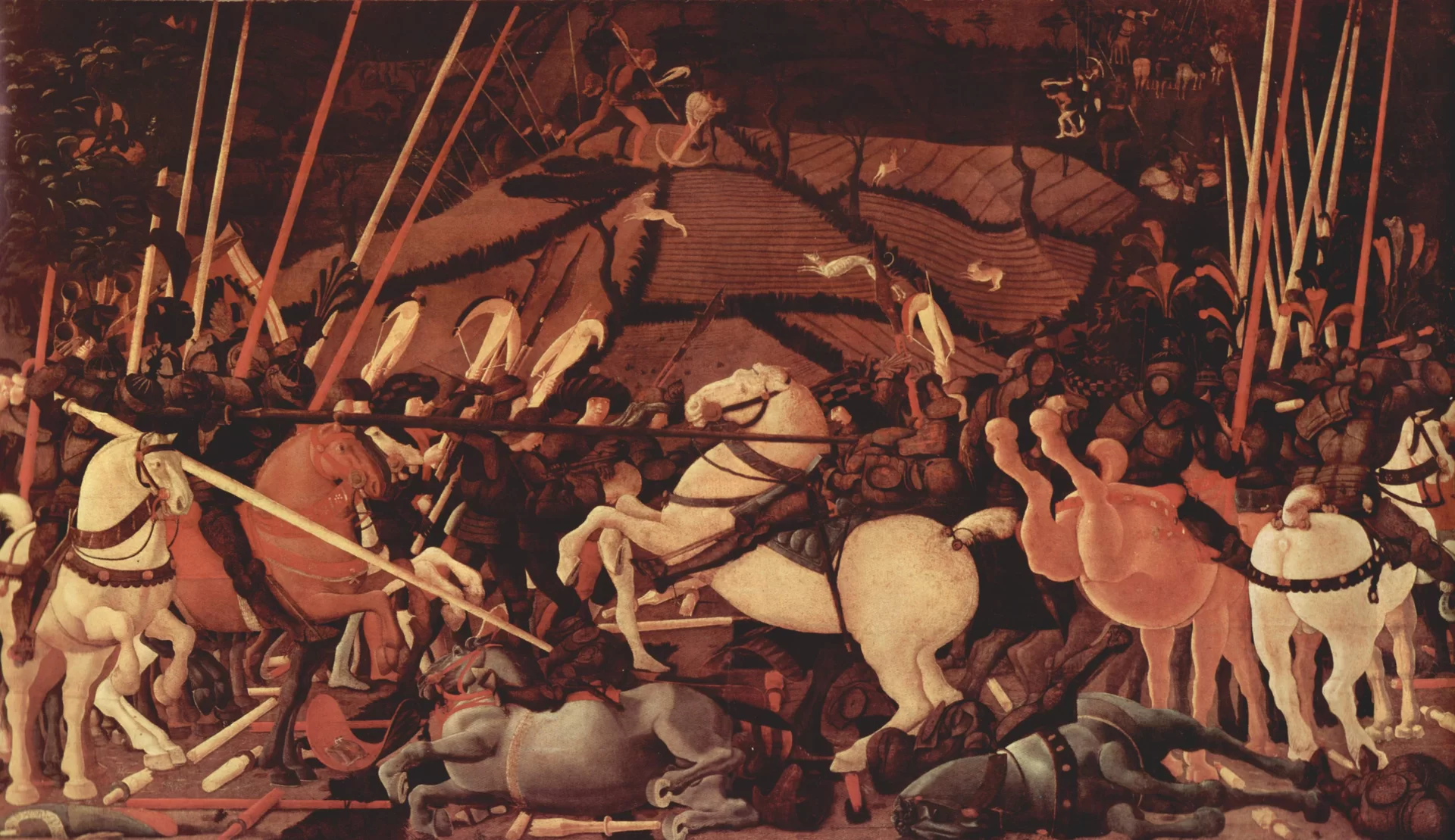 Ilustracja przedstawia obraz Paola Uccella „Bitwa pod San Romano”. Ukazuje scenę bitwy. Postacie na koniach, znajdujące się na pierwszym planie, są stłoczone. Niektóre konie leżą powalone na ziemię, inne stają dęba. Na ziemi leży wiele włóczni. Nad sceną sterczą długie lance. Tło obrazu przedstawia wzgórze, na którym biegają zwierzęta oraz znajdują się myśliwi z kuszami.