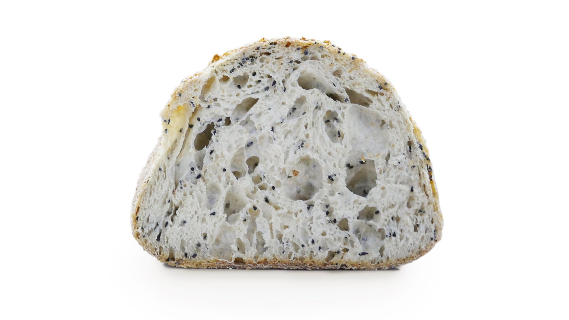 Zbliżenie przekroju kęsa ciasta mieszanego pokazujące strukturę w fazie wypieku z wadą niedopieczenia