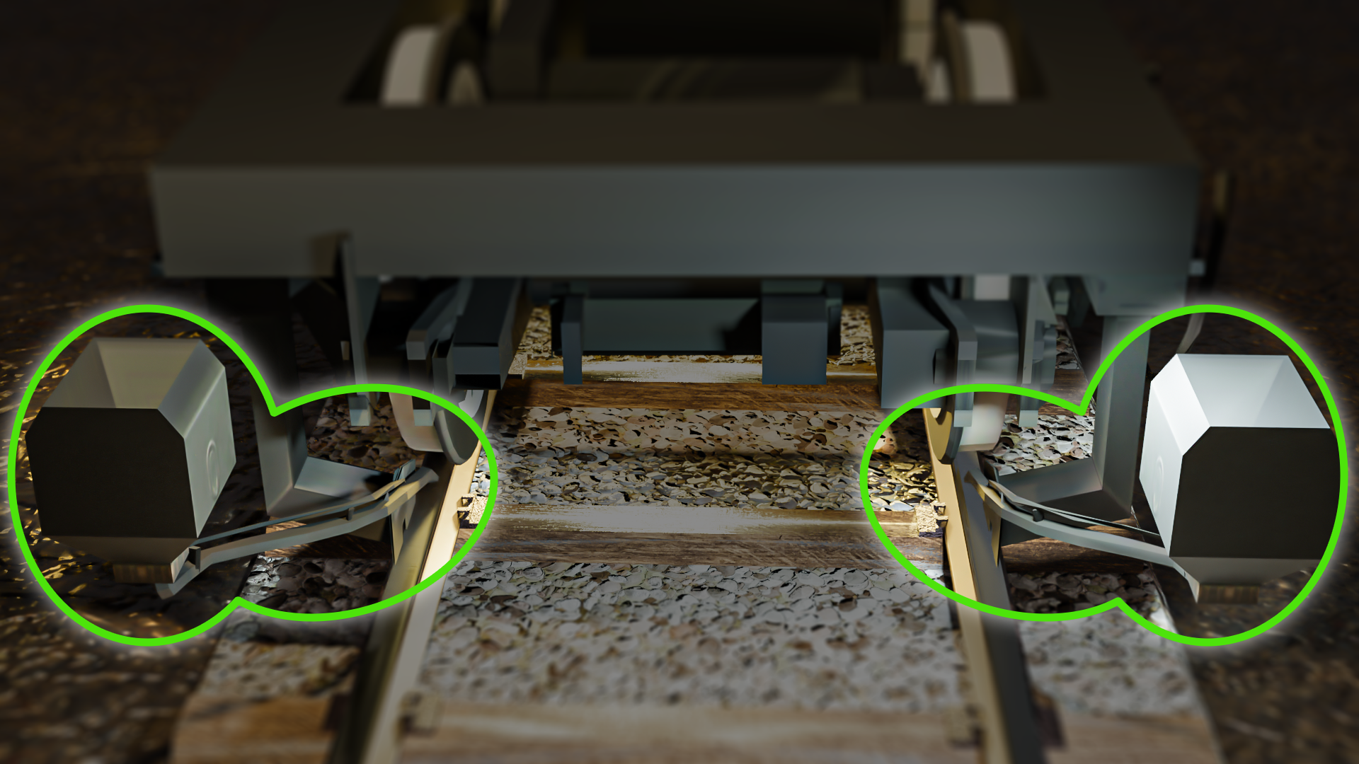 Grafika przedstawia dwie piasecznice zamontowane na podwoziu pociągu. Piasecznice wyszczególnione są zielonymi ramkami, wszystko wokół ramek jest przyciemnione i mniej wyraźne. Widać pojemniki z piaskiem oraz rury i dysze piasecznic, skierowane w miejsce styku kół z szynami.