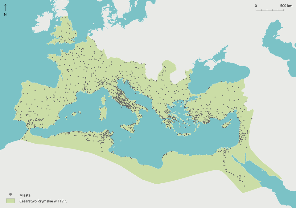Ilustracja przedstawia mapę obszaru basenu Morza Śródziemnego i przylegających do niego lądów, które składają się na obszar Cesarstwa Rzymskiego z 117 roku. Na mapie zaznaczone zostały czarnymi kropkami miasta. Największe natężenie kropek jest zauważalne na Półwyspie Apenińskim oraz na południu Półwyspu Bałkańskiego.