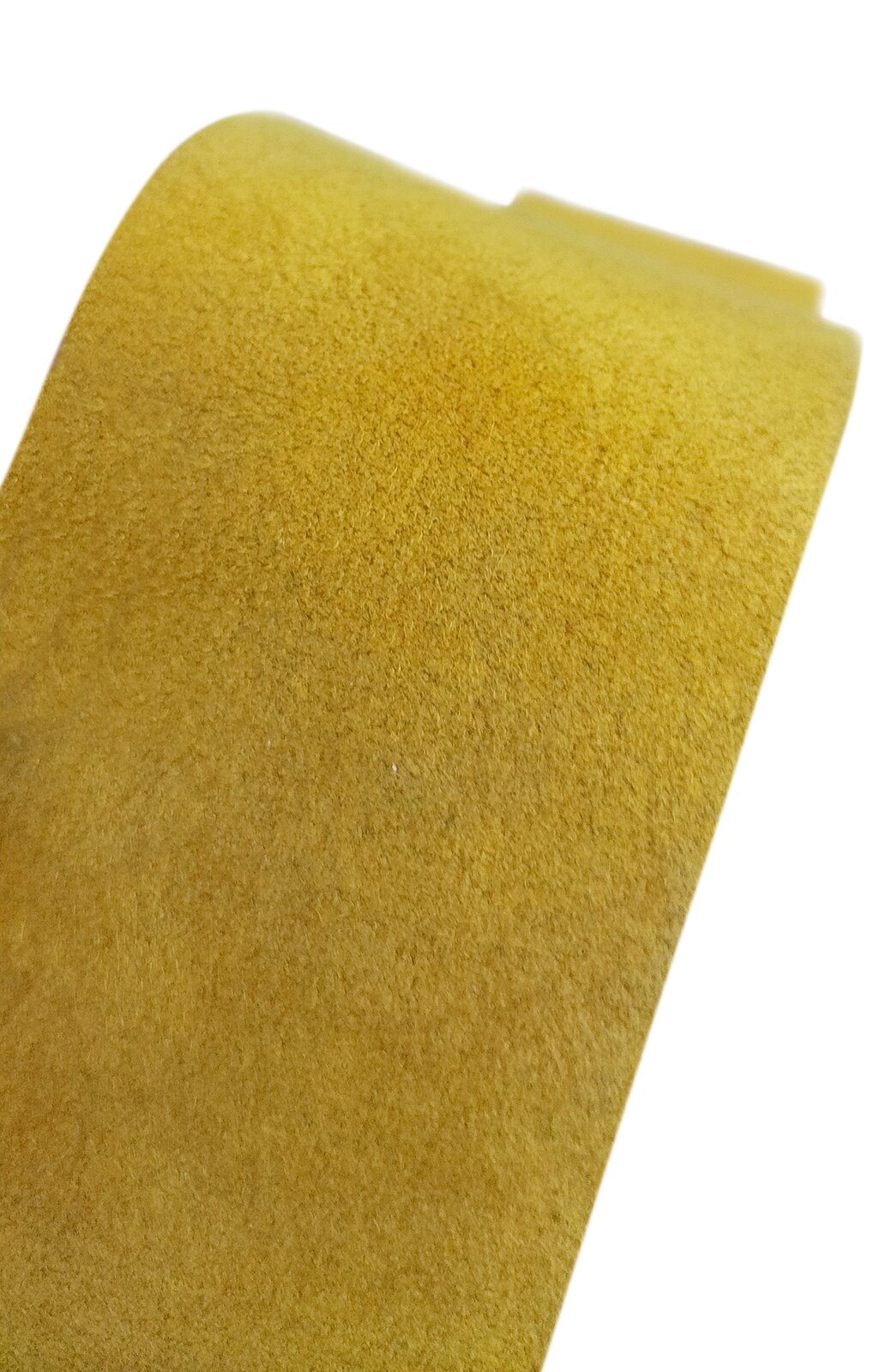 Zdjęcie przedstawia skórkę jelonkową. Widoczny jest prostokątny, zagięty płat skórki w kolorze żółtym.