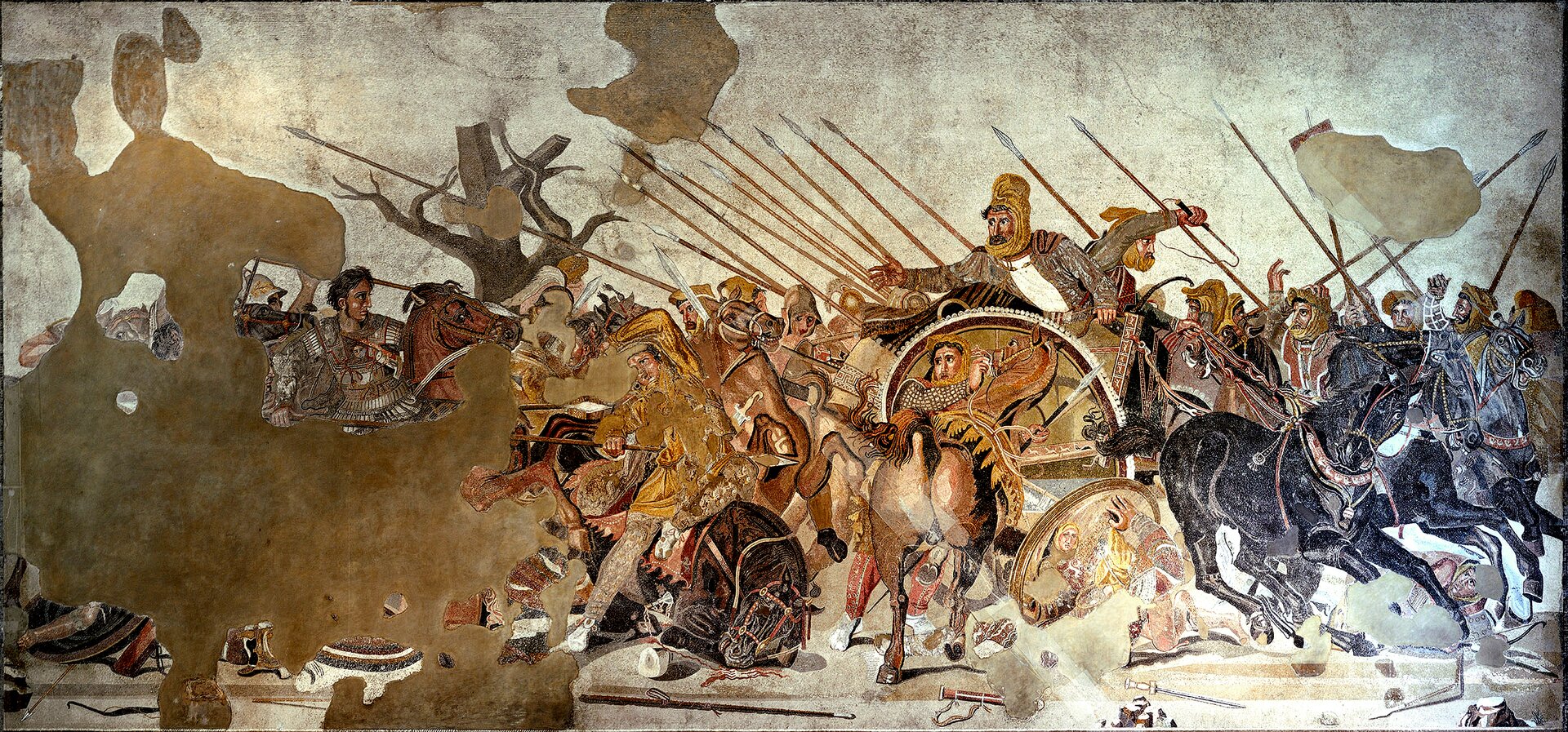Ilustracja przedstawia mozaikę pochodzącą z tzw. Domu Fauna w Pompejach. Ukazana jest na niej bitwa Macedończyków z Persami pod Issos w 333 r. p.n. e. Przedstawieni są żołnierze walczący konno na polu bitwy. Z lewej strony obrazu ukazany jest z profilu Aleksander Wielki na koniu. Ubrany jest w srebrną zbroję; ma czarne krótkie włosy i duże oczy. Naciera na króla Persów – Dariusza, który siedzi na kwadrydze obok woźnicy. Mimo, że jest atakowany ze wszystkich stron, wychyla się z powozu wyciągając przed siebie rękę. Ma na głowie żółtą chustę; ubrany jest w ciemną szatę i jasną koszulę. Po lewej stronie ilustracji znajduje się nagie drzewo symbolizujące zimę – porę roku, podczas której rozegrano bitwę.