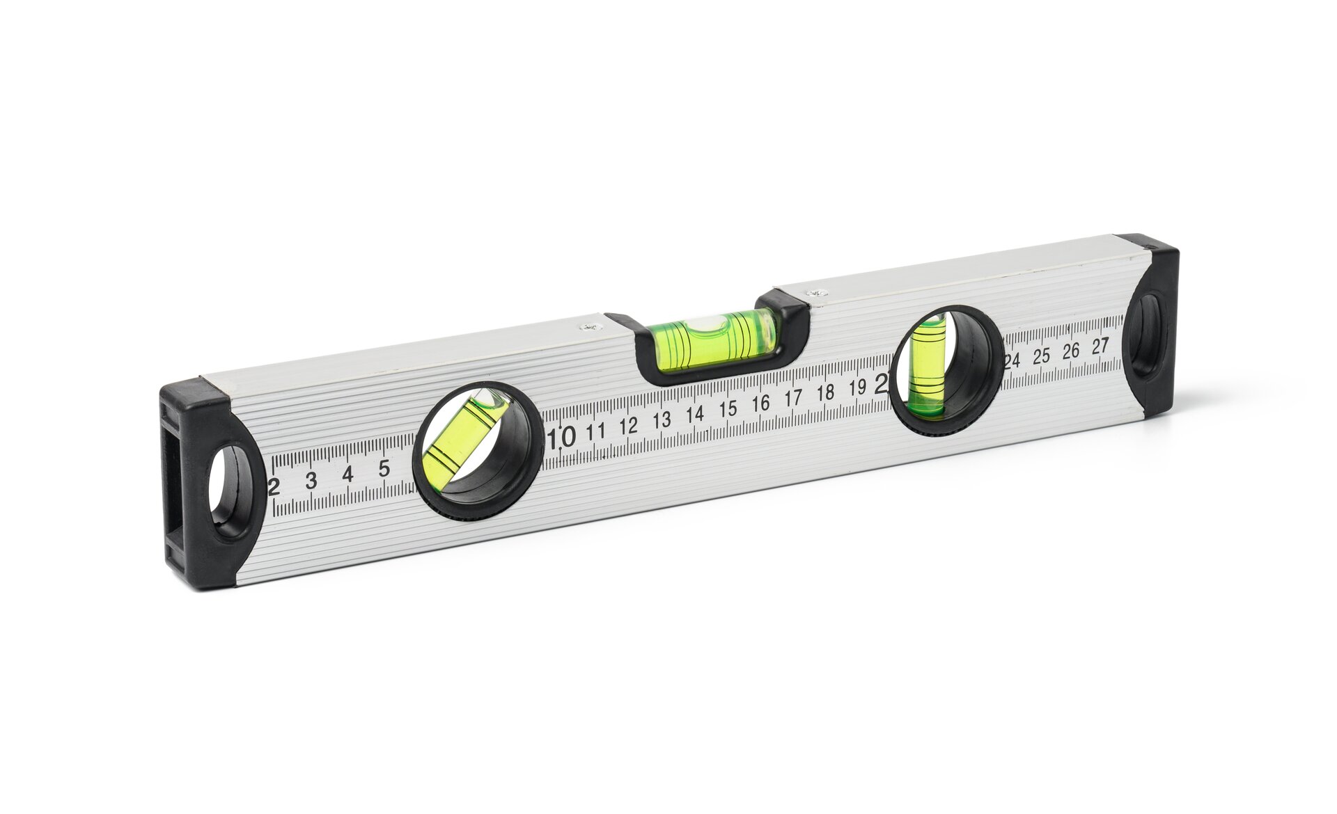 Ilustracja przedstawia prostokątne narzędzie pomiarowe. Na podłużnej listwie w środkowej części zamieszczone są niewielkie rurki wypełnione cieczą i pęcherzykiem powietrza. 