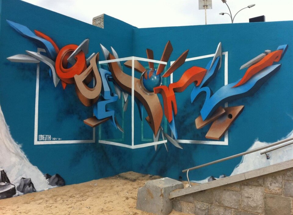 Ilustracja przedstawia graffiti Sergio Odeith'a. Ukazuje wielobarwny napis zamieszczony w rogu muru w taki sposób, że tworzy efekt trójwymiarowy. Na ścianie i podłodze został namalowany cień napisu. Dodatkowo wprowadzono biały kontur łamanej ściany, składającej się z czterech części.